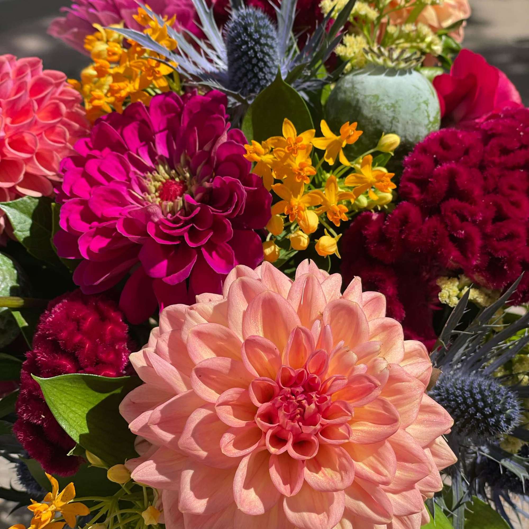 For those who love vibrant color and expressive design. This arrangement features