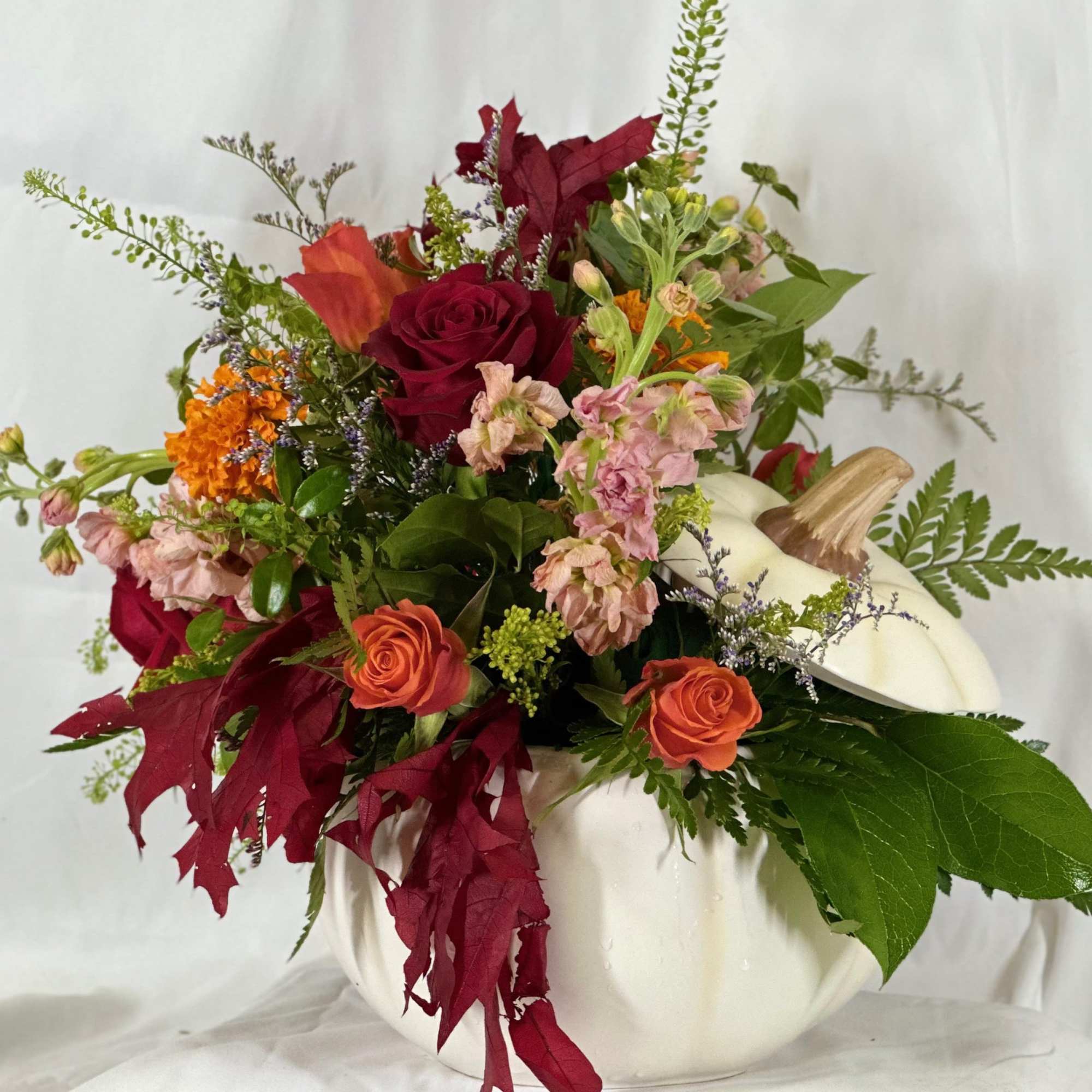 Fun and festive, this Fall flower arrangement features Autumn hues of stock, photo 2 of 2