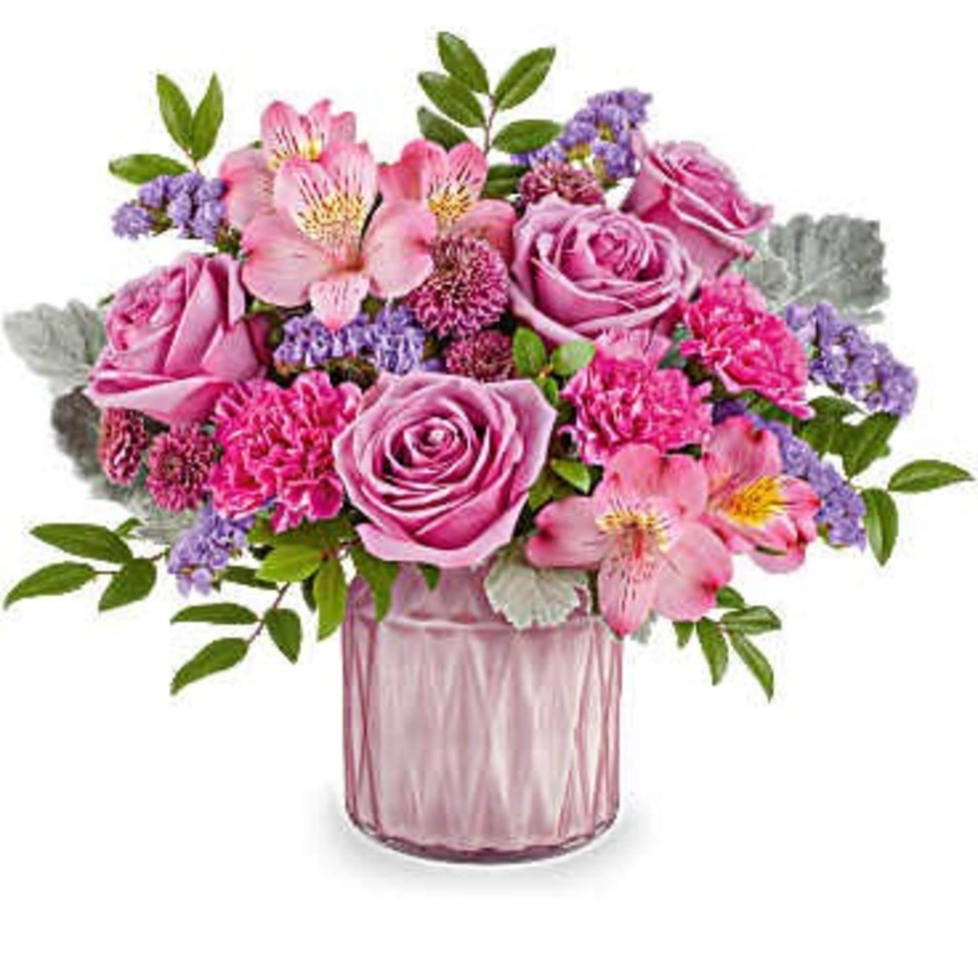 Pink roses and alstroemeria in a pink glass vase