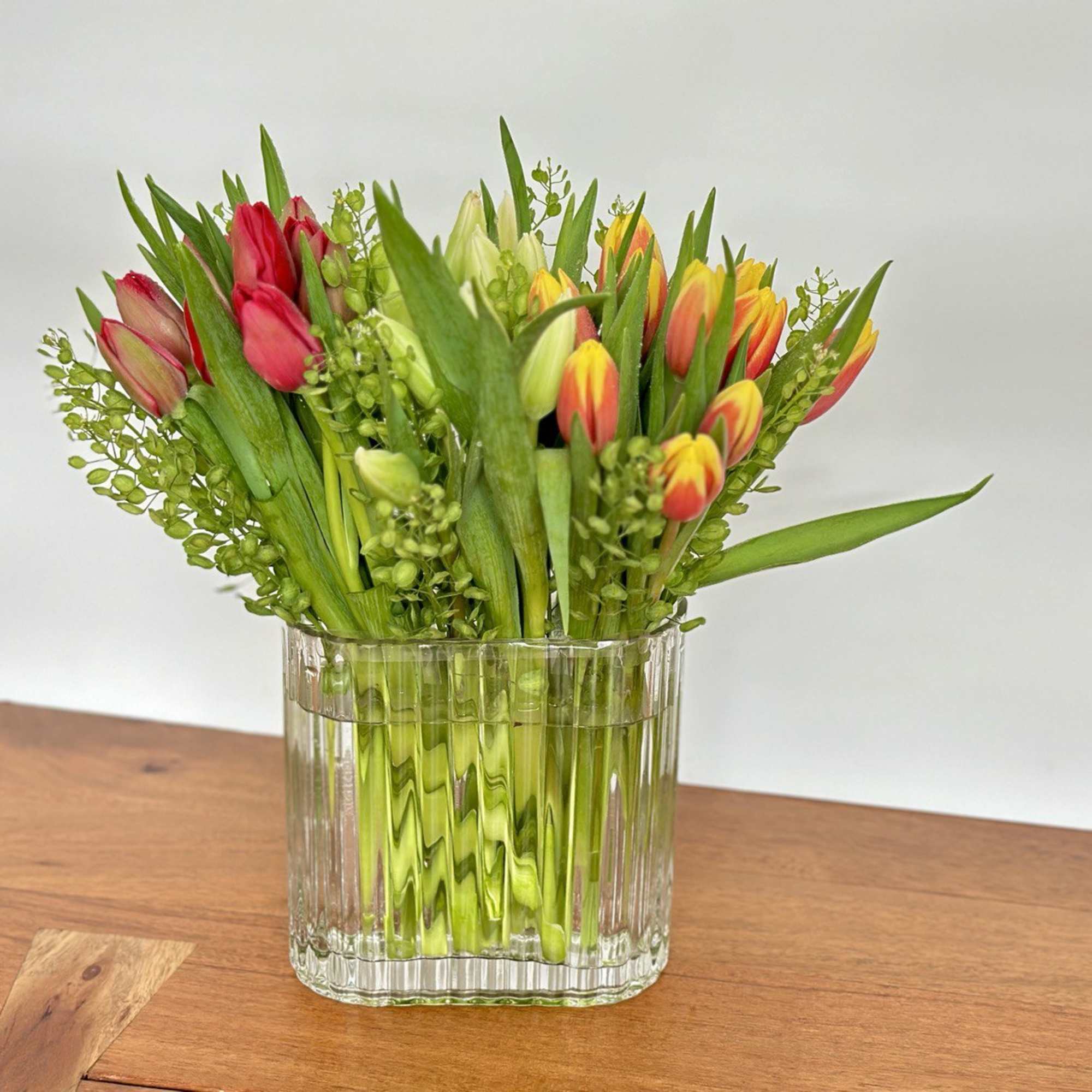 Tulip bouquet in a clear glass vase