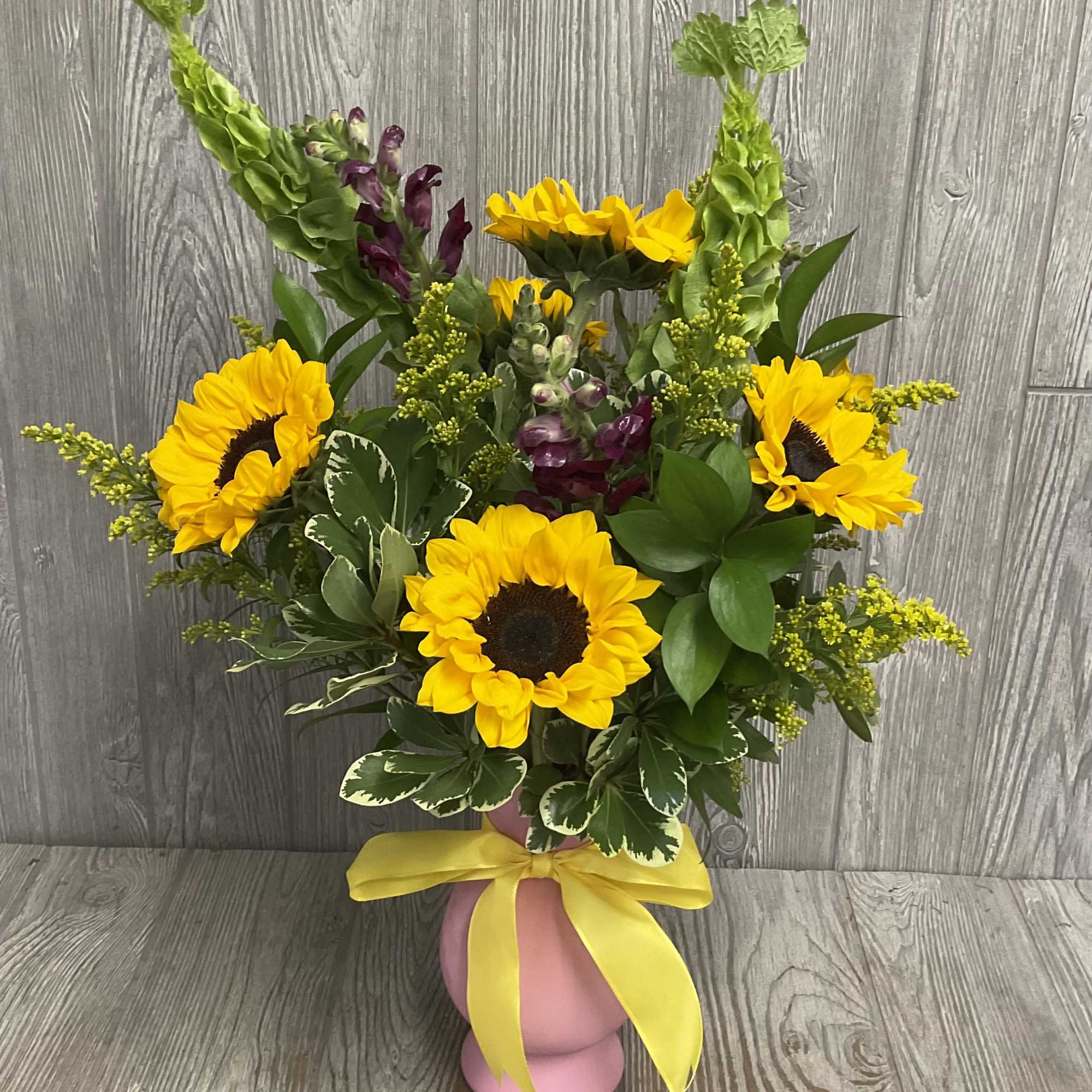 This arrangement is pet friendly! Flowers may vary but will stay pet
