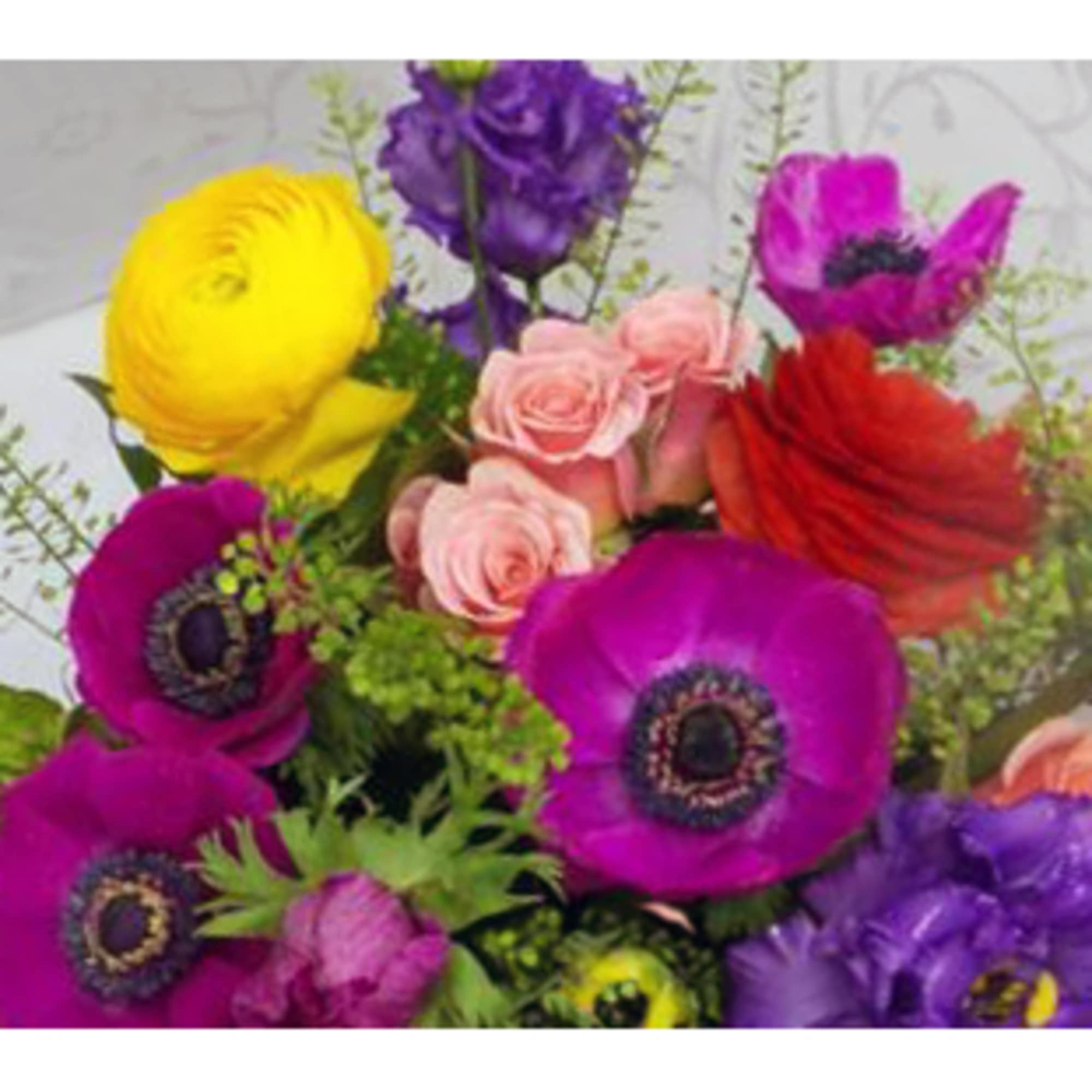 Bright mixed bouquet with purple, pink, yellow, and red flowers