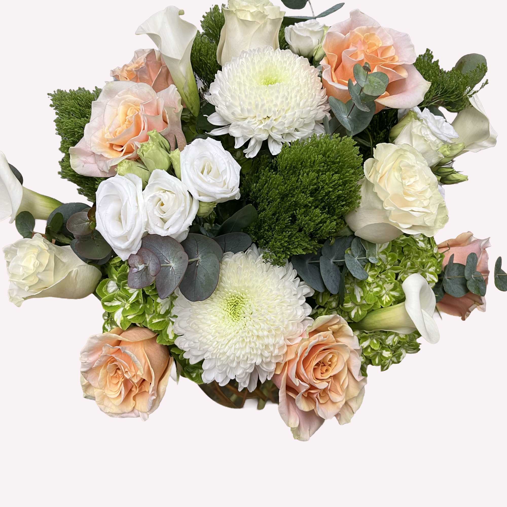 Bouquet of peach and white roses with white chrysanthemums and calla lilies