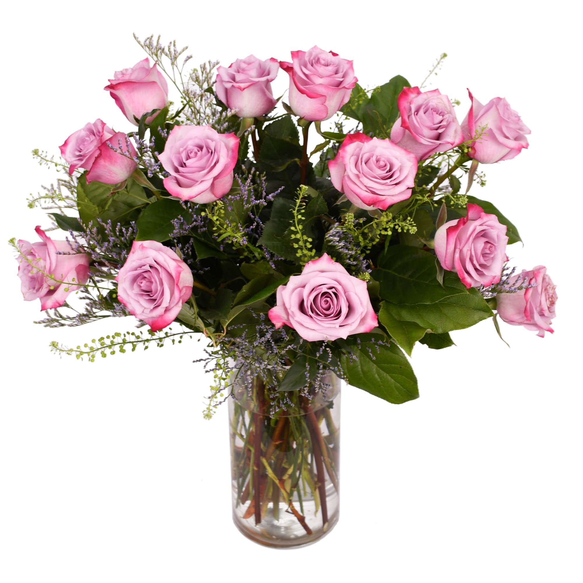 Pink roses arranged in a clear glass vase