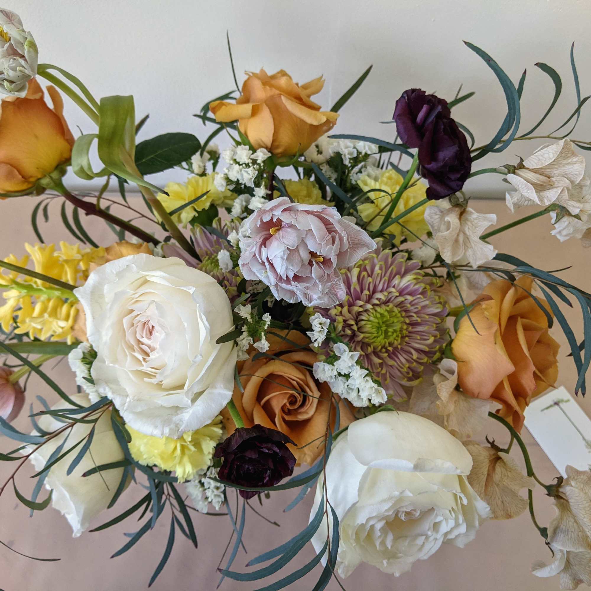 Mixed bouquet with roses, chrysanthemums, and white blooms