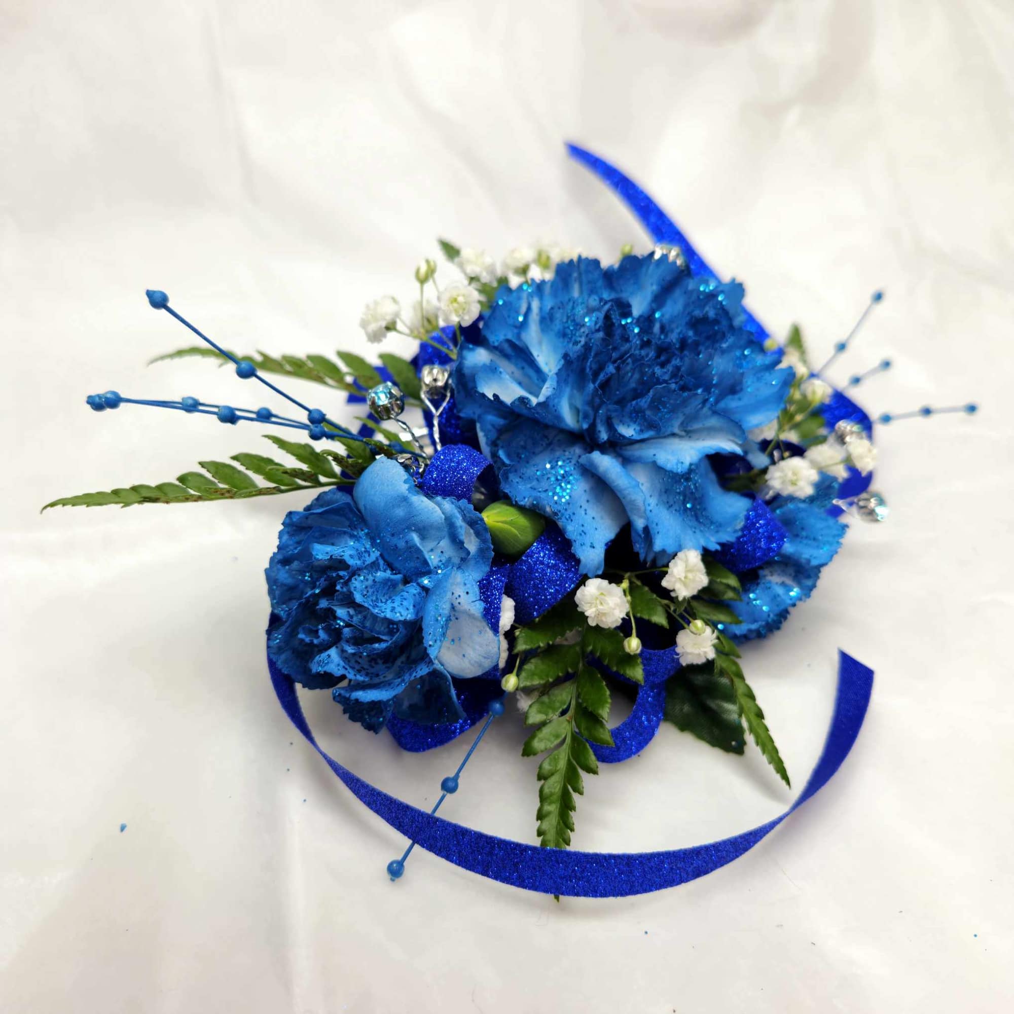 Blue carnation corsage with white baby's breath and ribbon, photo 2 of 3