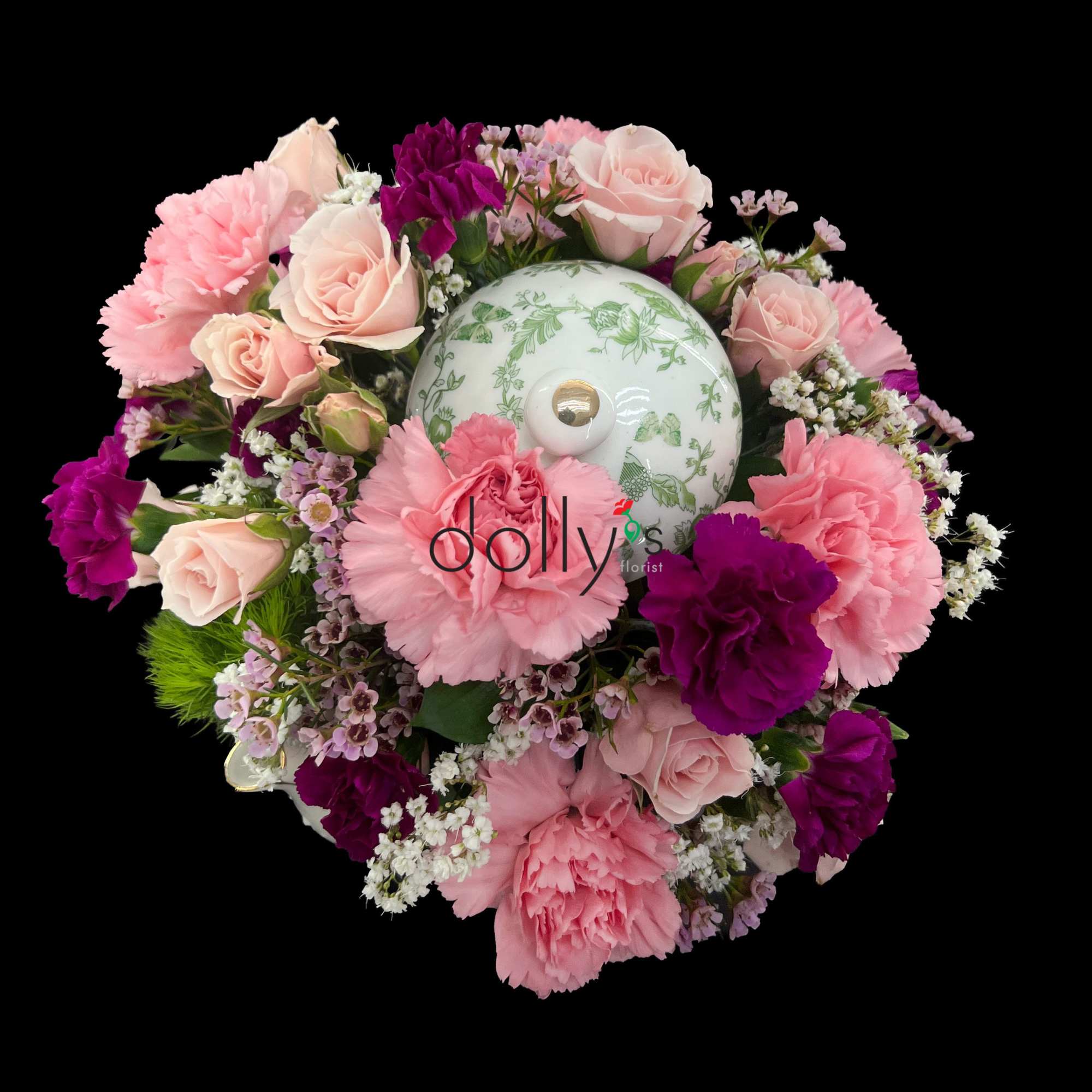 A dense, rounded cluster of blush and deep purple blooms arranged in, photo 3 of 3