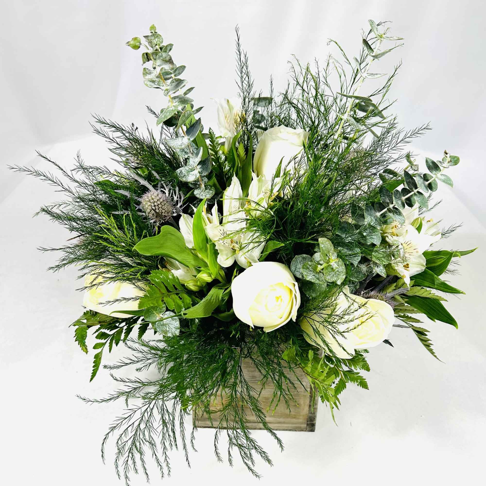 Complementing the arrangement is our wooden cube with a all-around arrangement with