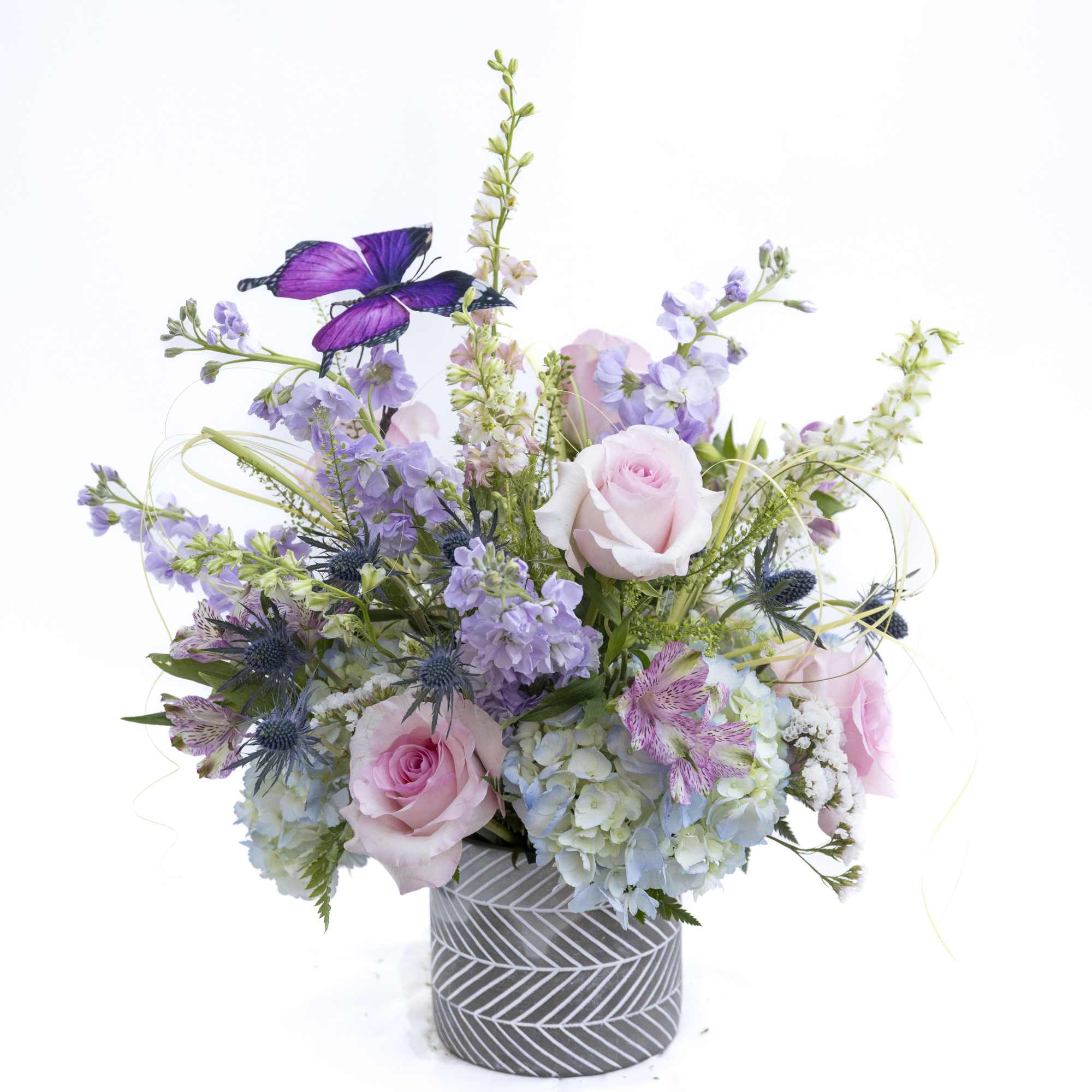 Whimsical and full of garden-inspired charm, this enchanting arrangement brings together soft, photo 2 of 4