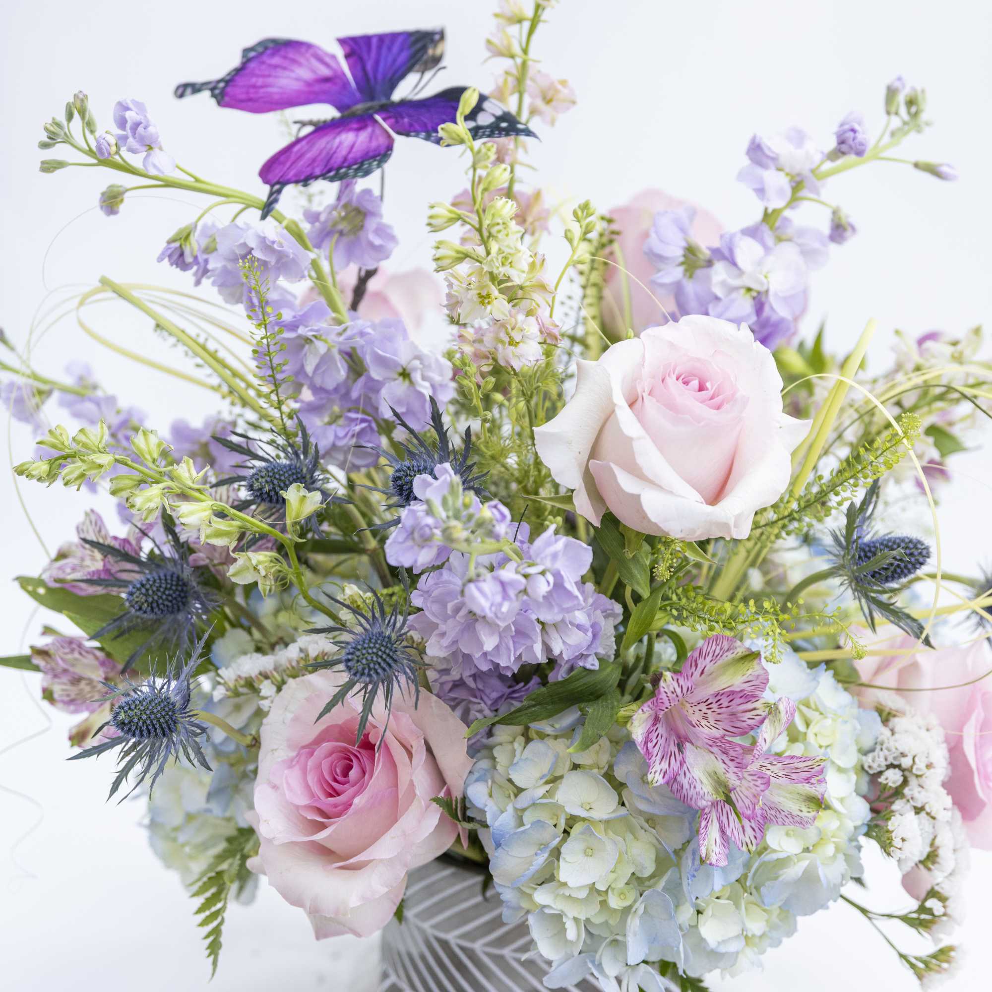 Whimsical and full of garden-inspired charm, this enchanting arrangement brings together soft, photo 3 of 4
