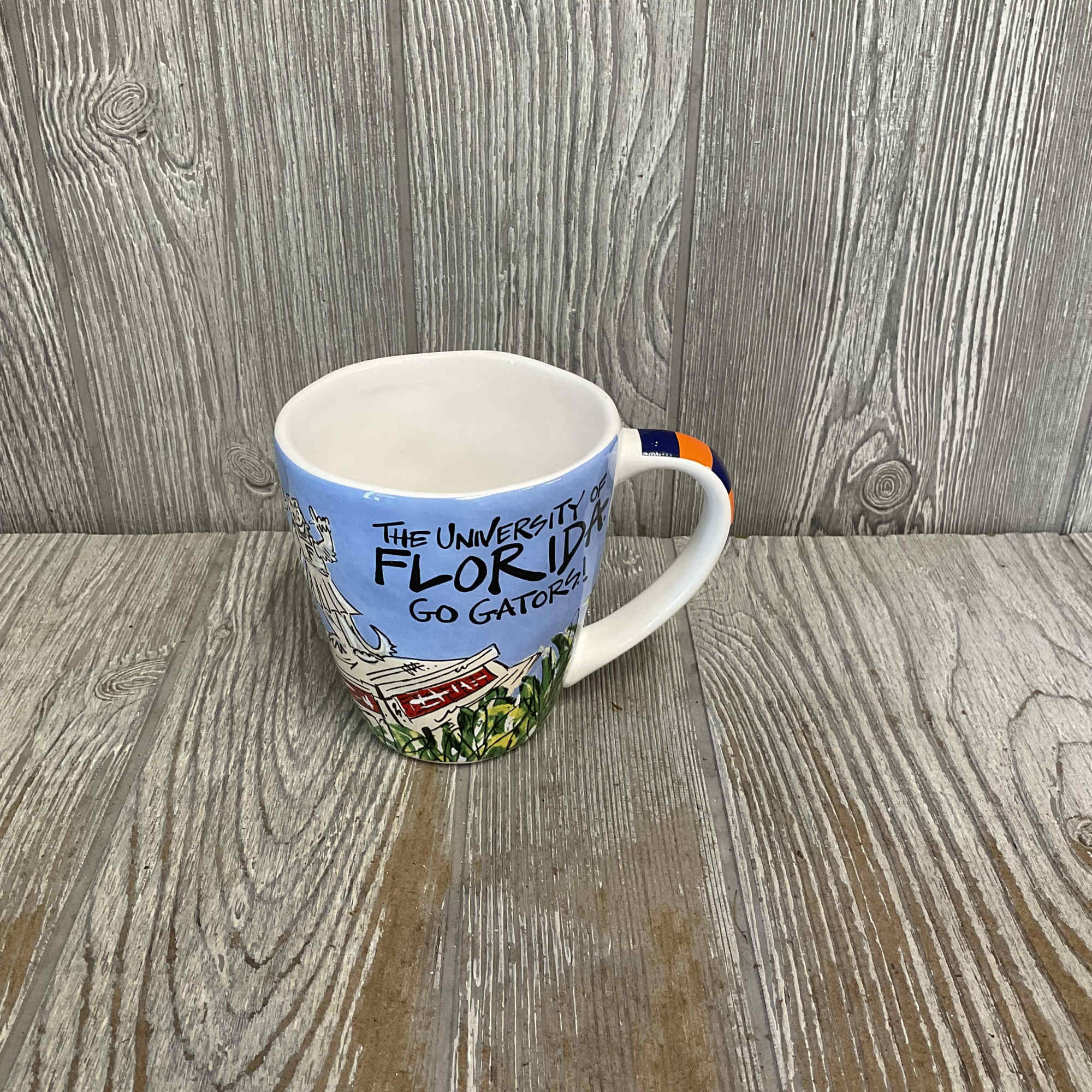 Mixed flowers in a keepsake ceramic Gator artwork mug. Flowers may vary., photo 4 of 4