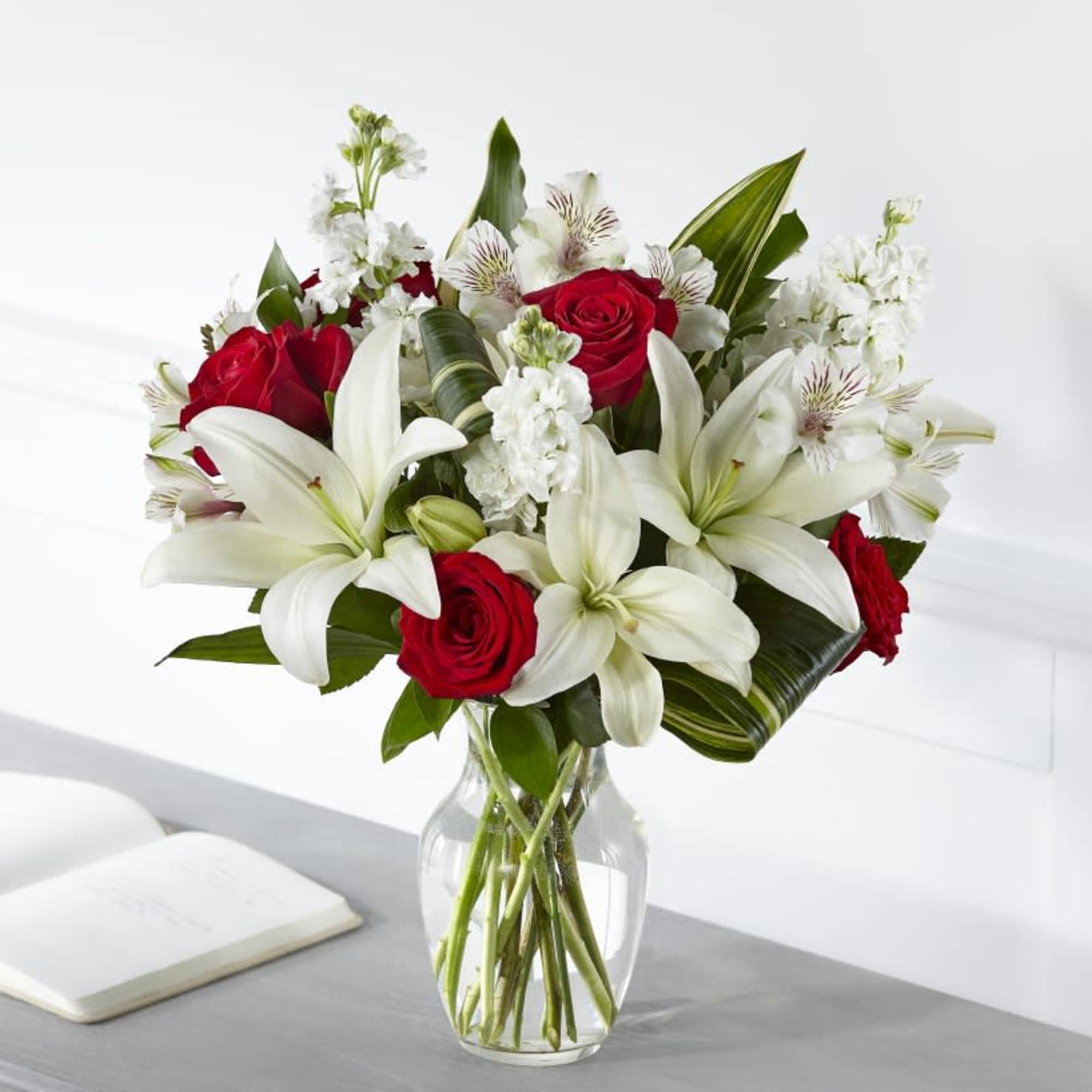 Elegantly crafted with a stunning mix of red and white blooms, our