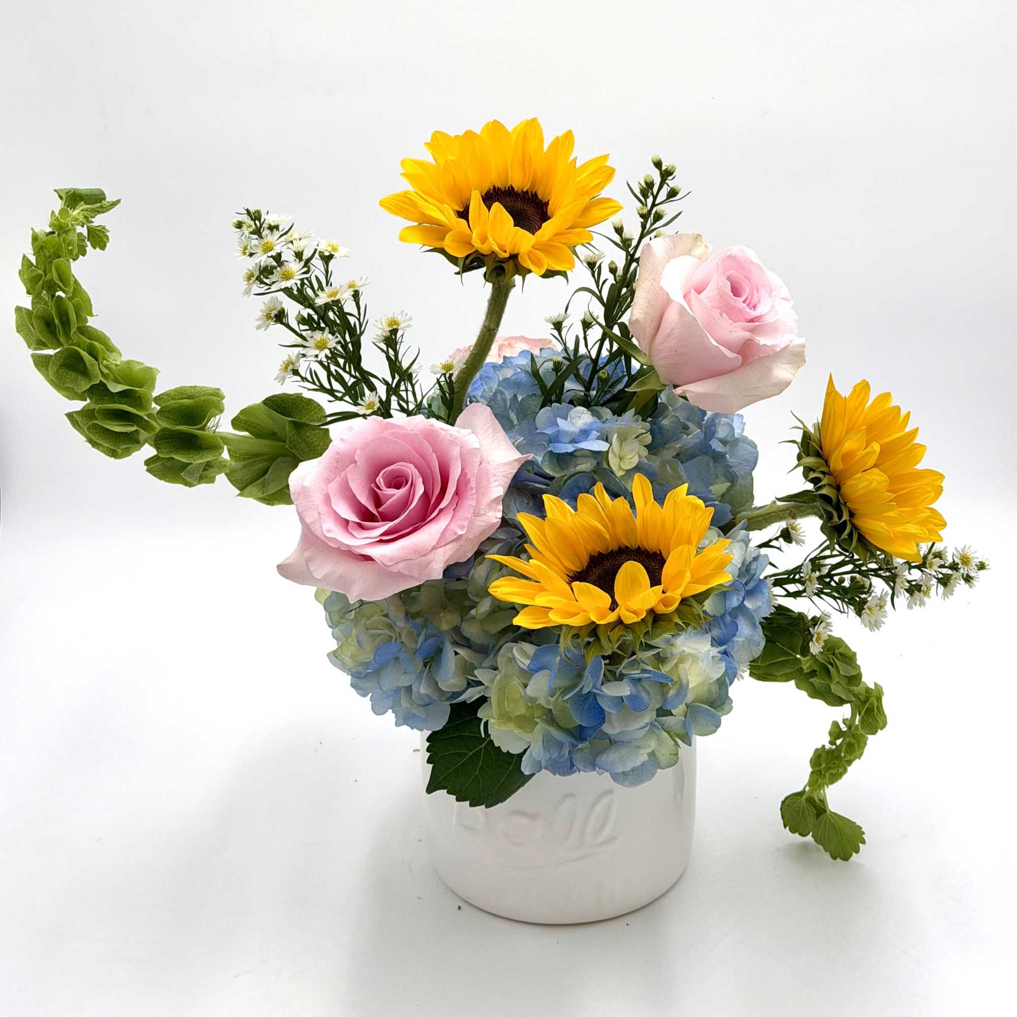 Sunbeam is a bright and modern floral arrangement designed to capture the