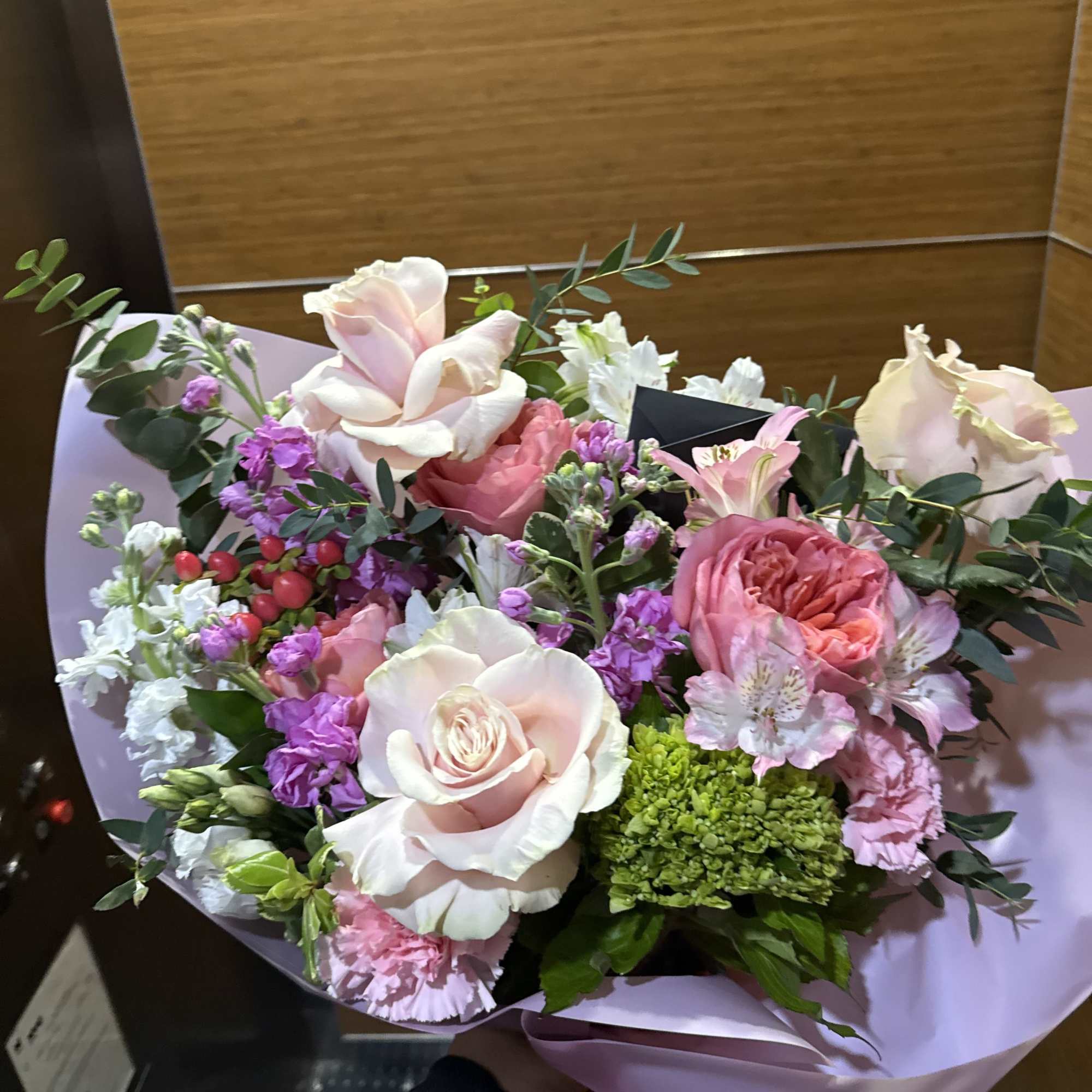 Sweet pastel bouquet with roses, lisianthus, and hydrangea tones &mdash; soft, dreamy