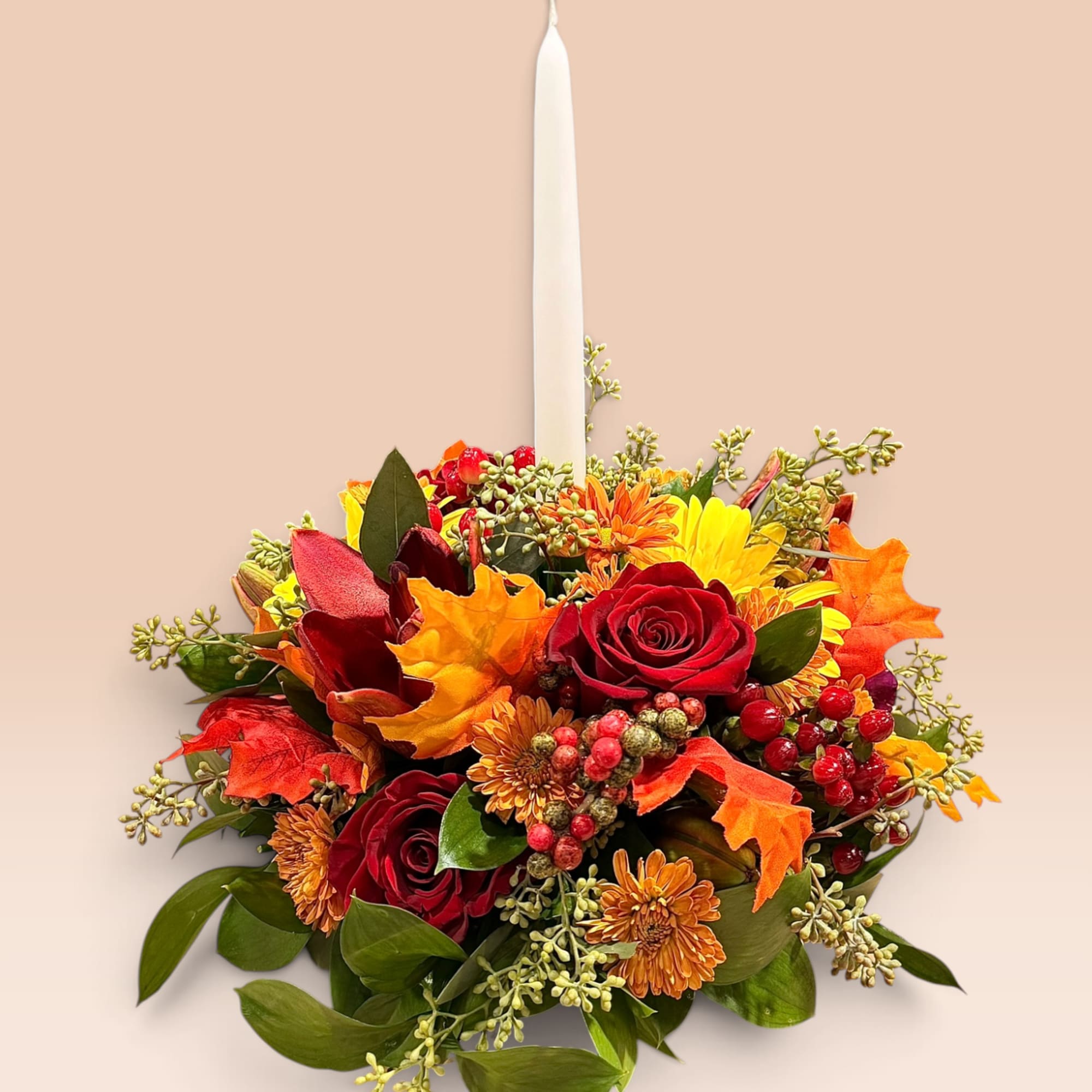 Autumn floral candle arrangement with red roses and orange blooms
