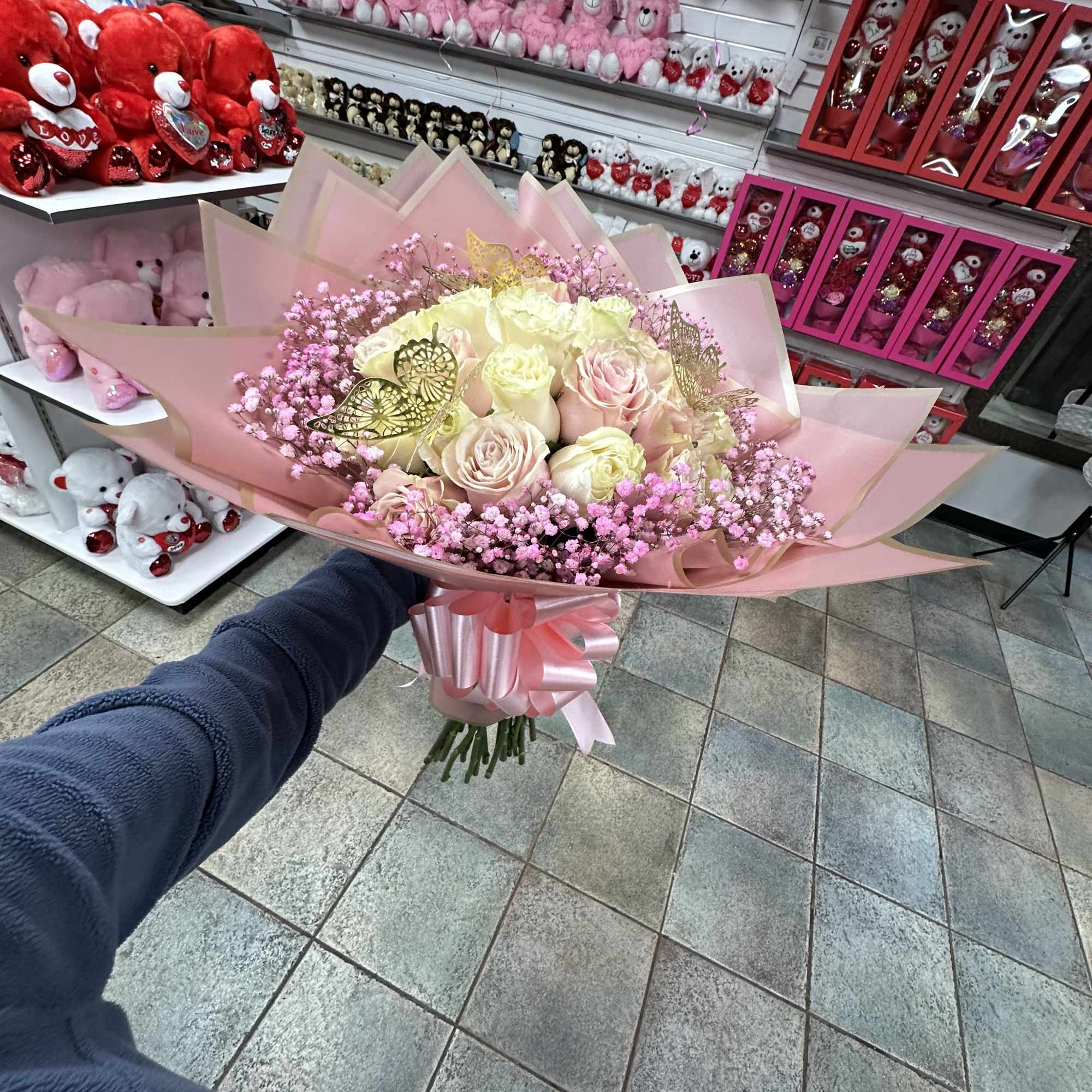 24  roses bouquet wrap in a pink korean water proof paper
with