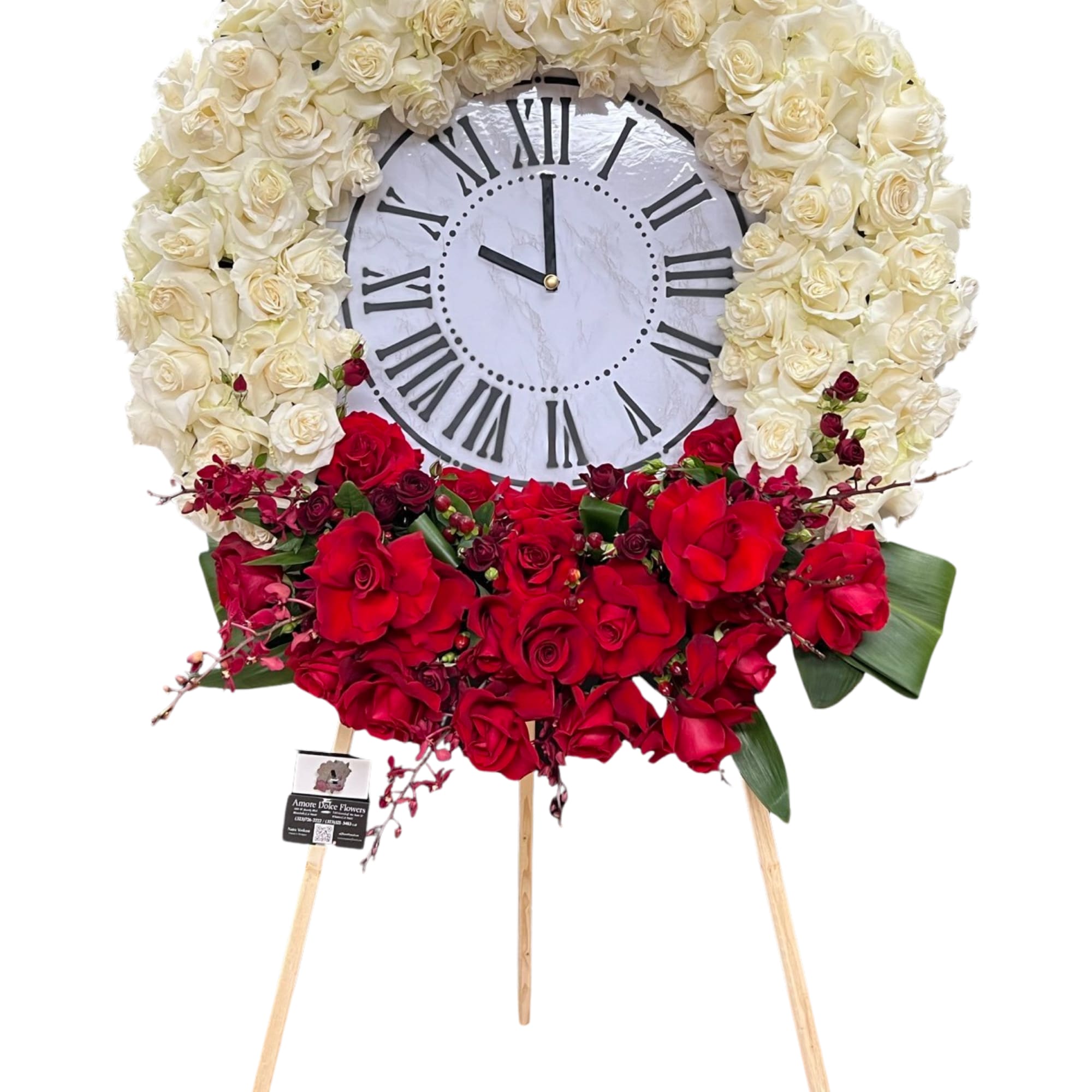 This elegant and meaningful floral clock arrangement symbolizes the passage of time