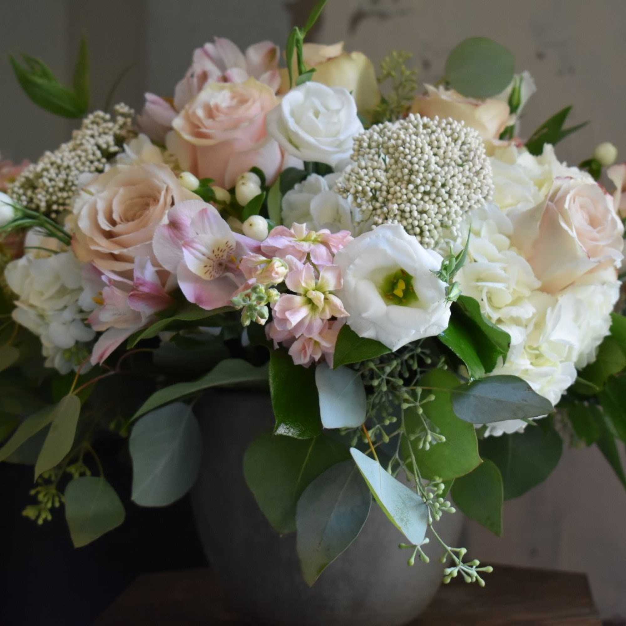 Each arrangement is custom designed, using seasonal, best-of-day blooms. The image shown, photo 3 of 3