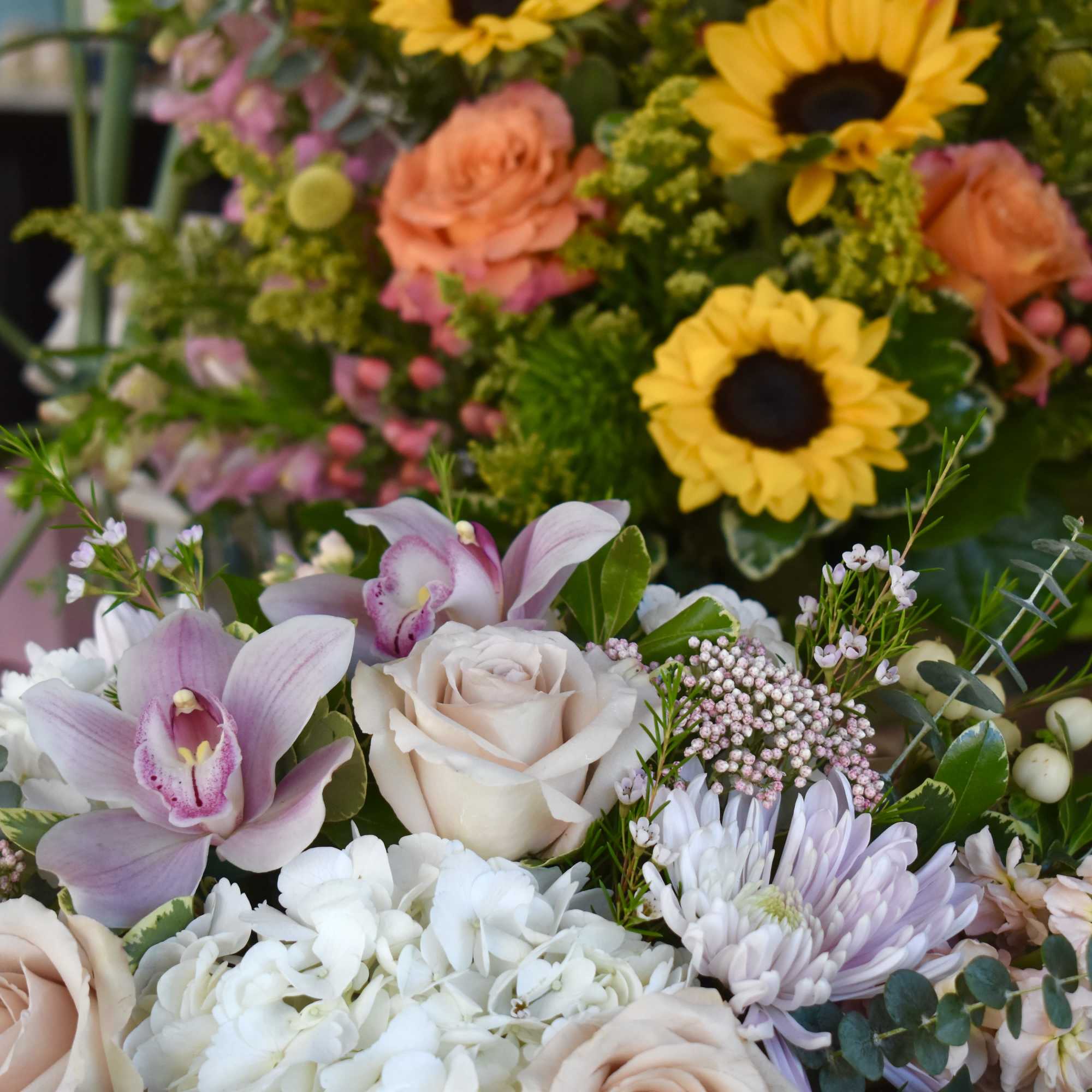 A custom-curated arrangement showcasing premium blooms in an elegant, one-of-a-kind presentation --