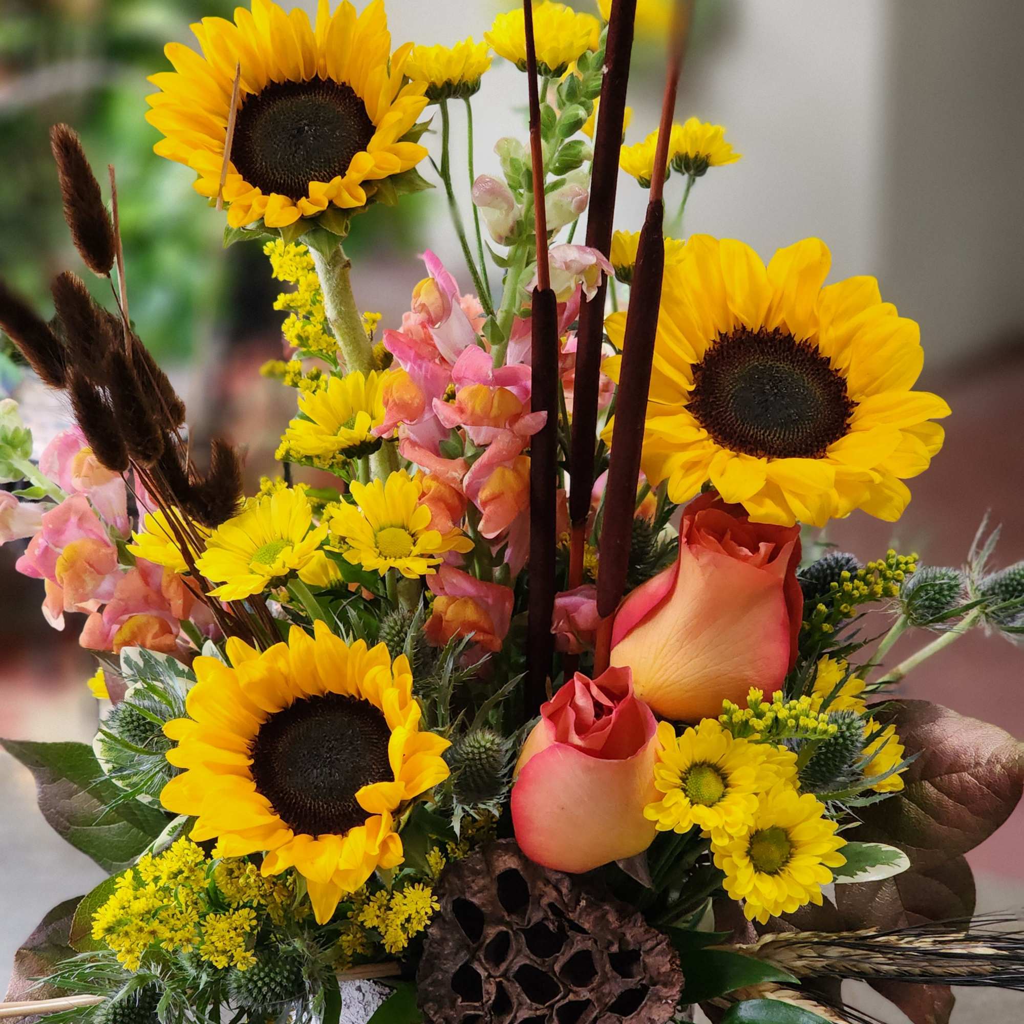 This beautiful rustic arrangement,  a sure sign of the fall season.