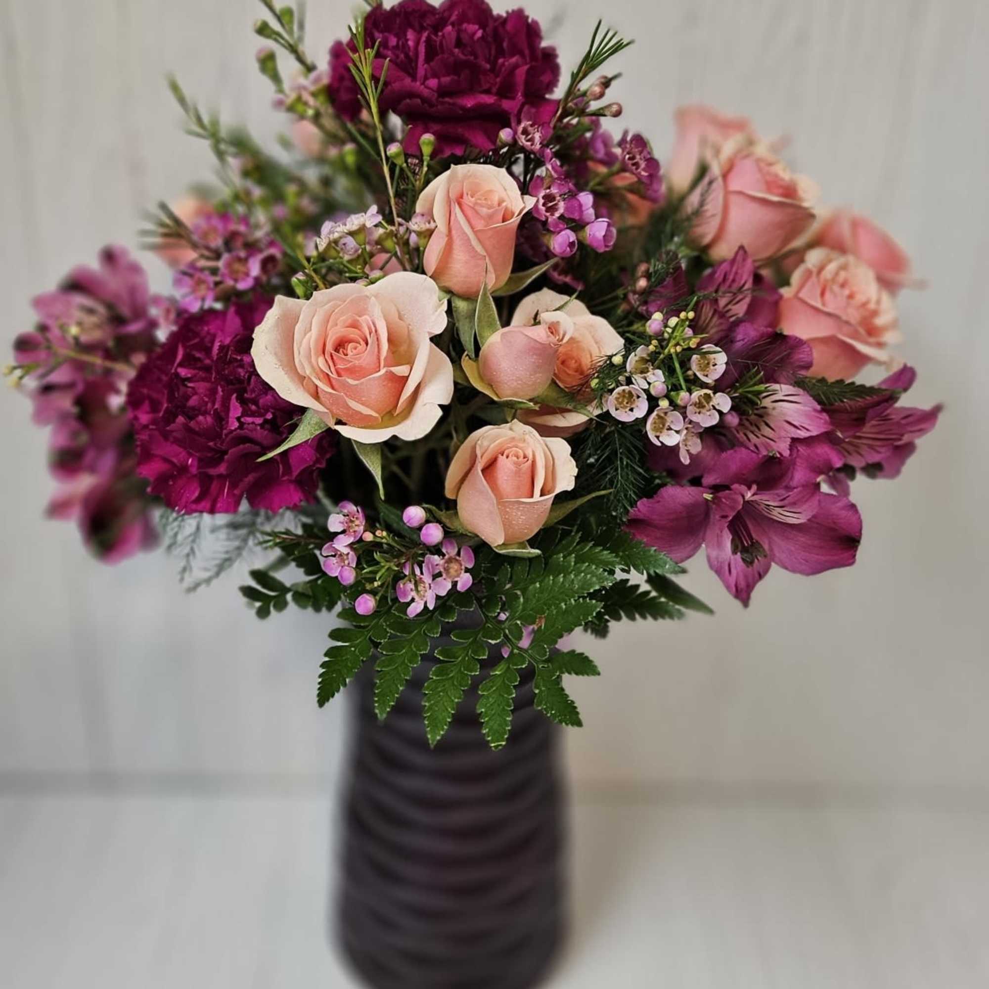 Colored Vase with coordinating flowers to match! Spray Roses, Carnations, Alstromeria, filler