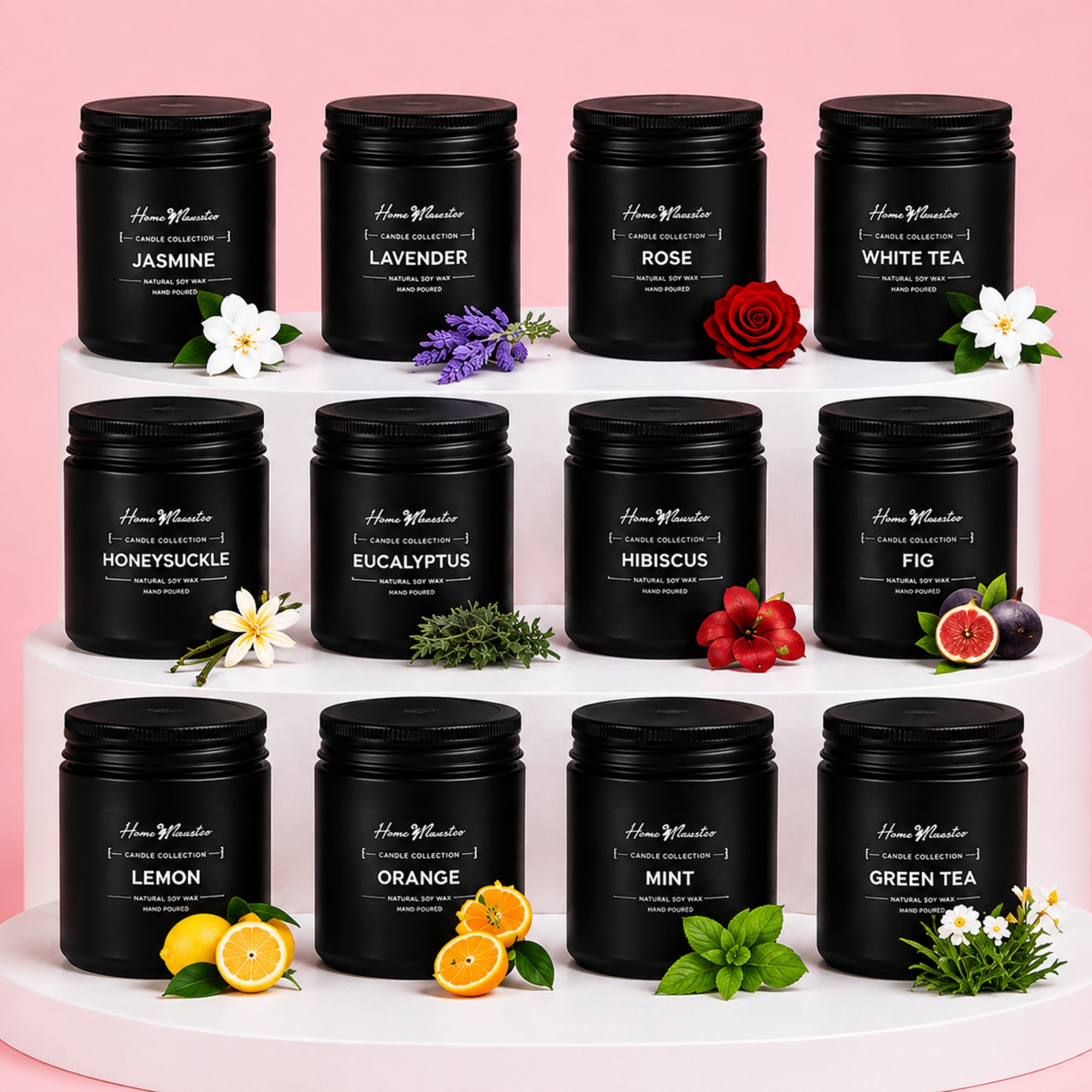 Set of black scented candles on white risers with small floral accents