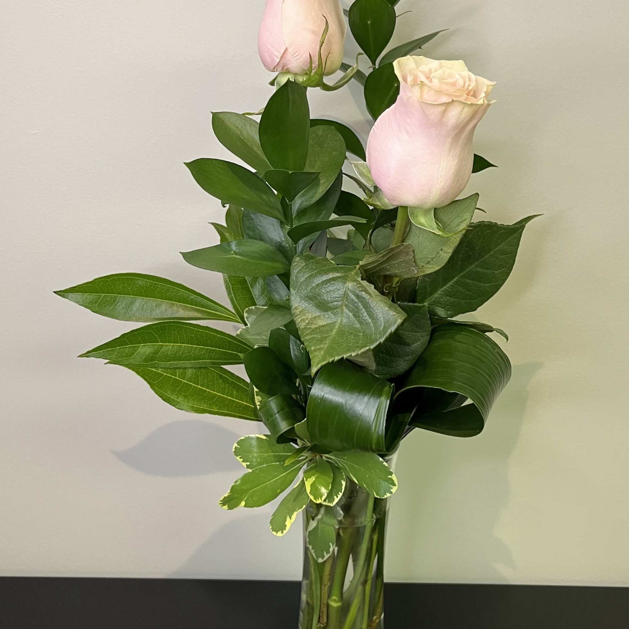 A simple declaration of love with a bud vase of a pink