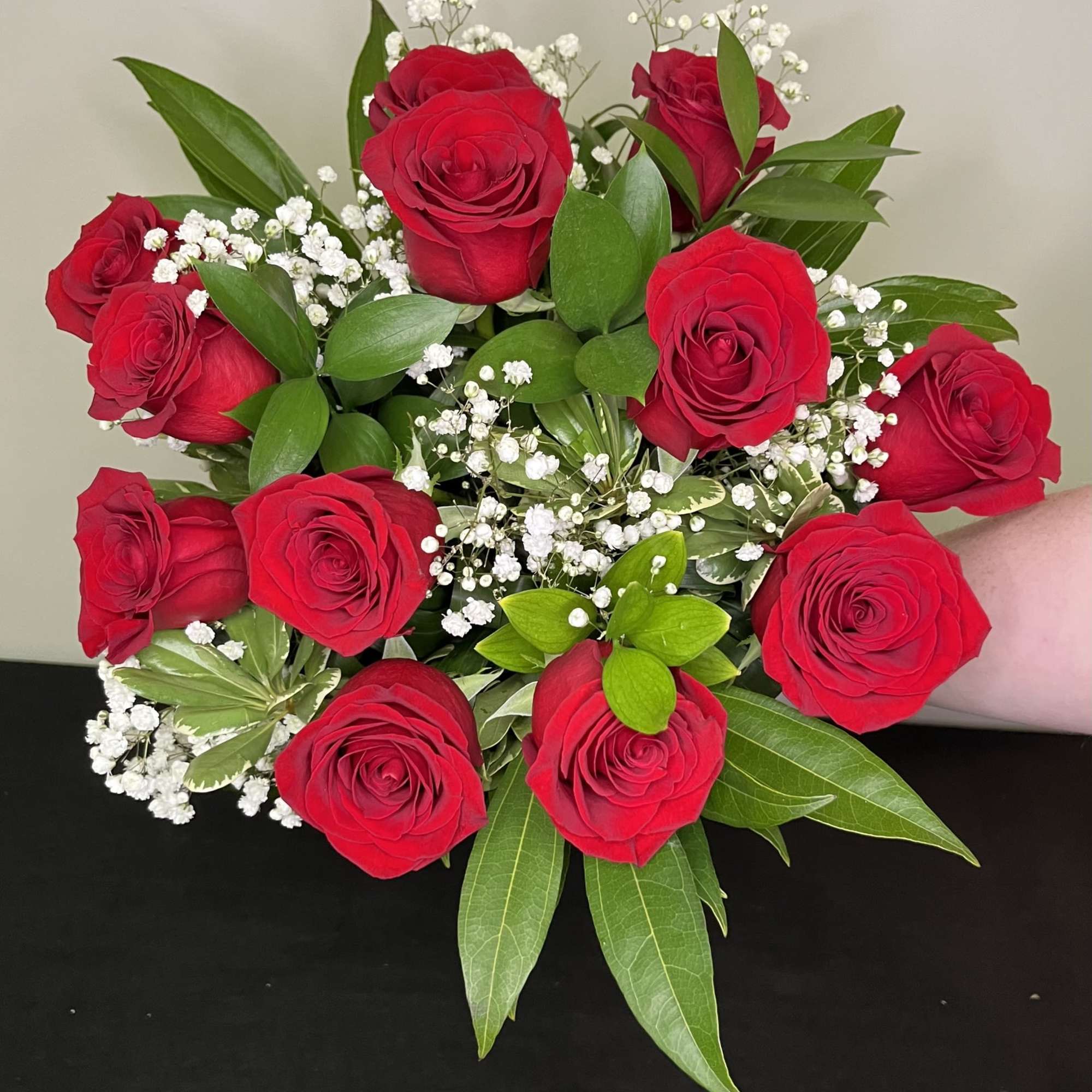 A bouquet of beautiful red roses arranged and ready for your favourite