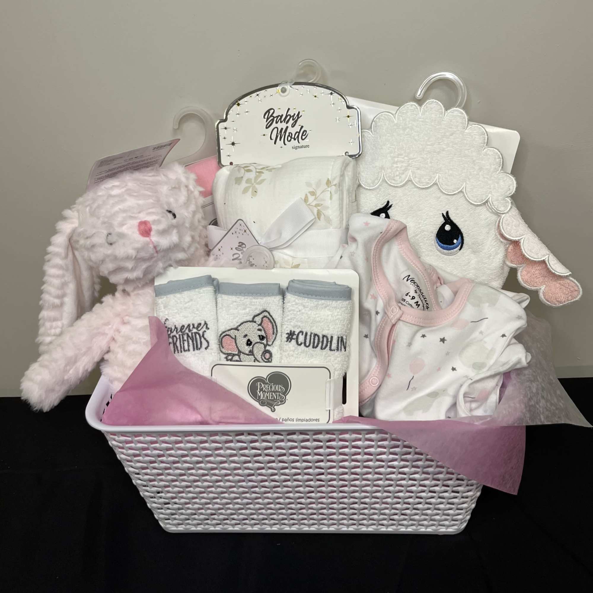 Baby love in spades with this adorable gift basket.  Available to