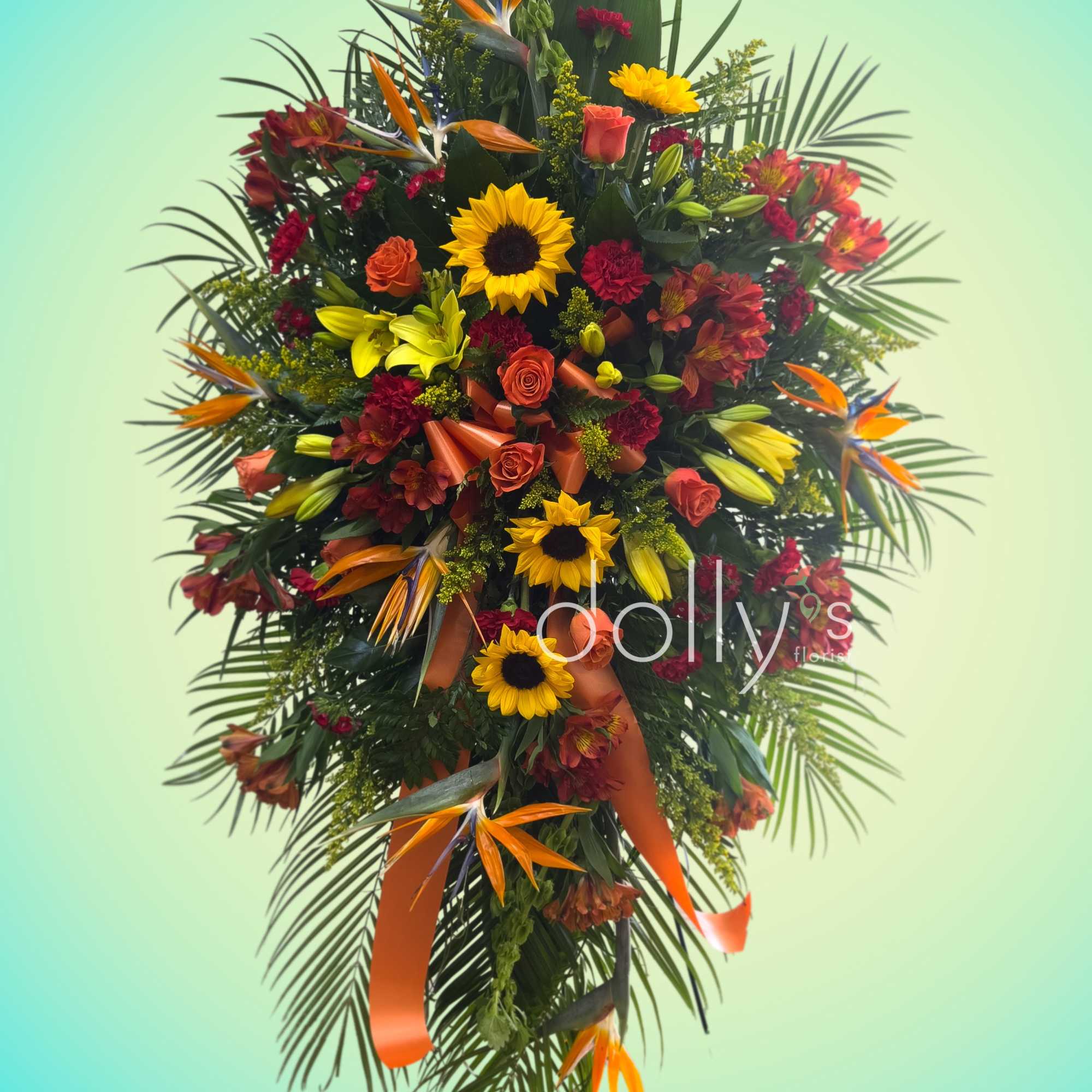 Tall tropical floral spray with sunflowers, roses, and orange bird-of-paradise