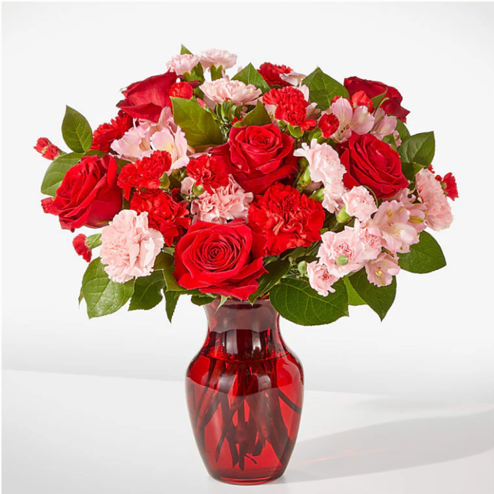 As sweet as candy, this pink and red arrangement is sure to