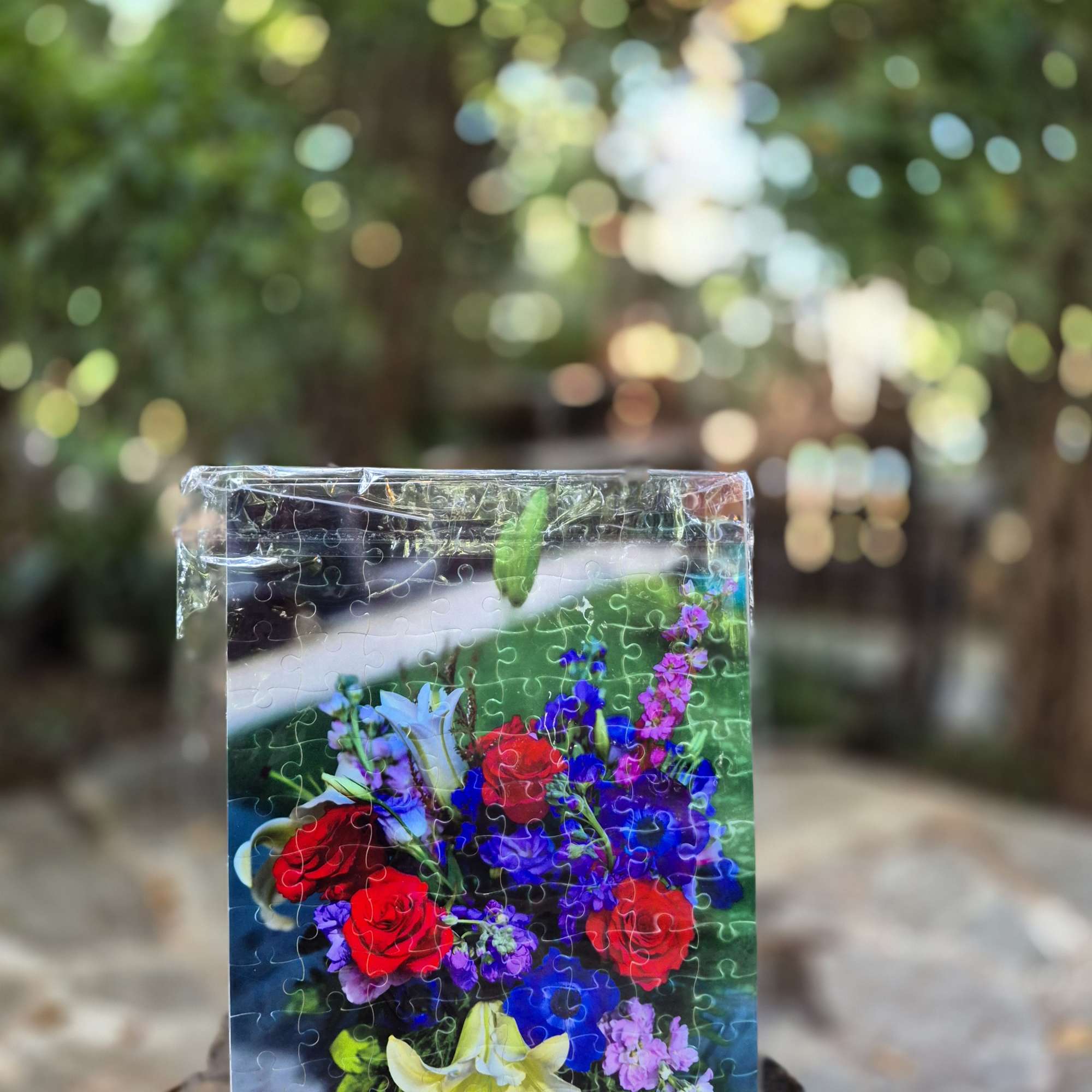 Puzzle box with a colorful floral bouquet design
