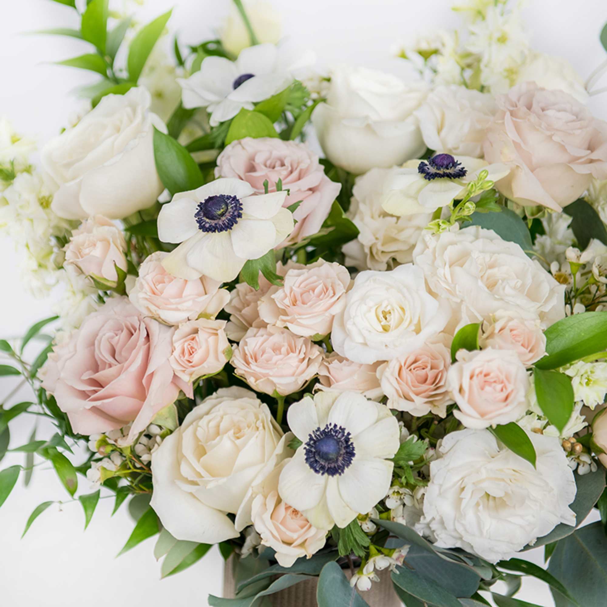 Blush and white rose bouquet with white anemones