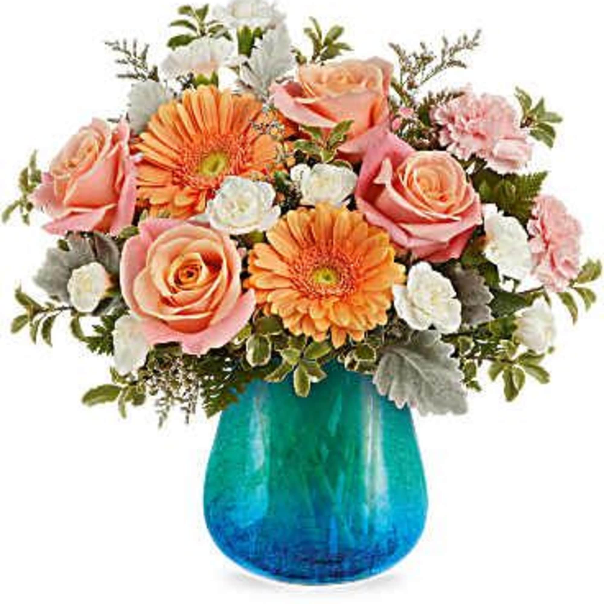 As radiant as a seaside sunrise, the Ocean Sunrise Bouquet brings together
