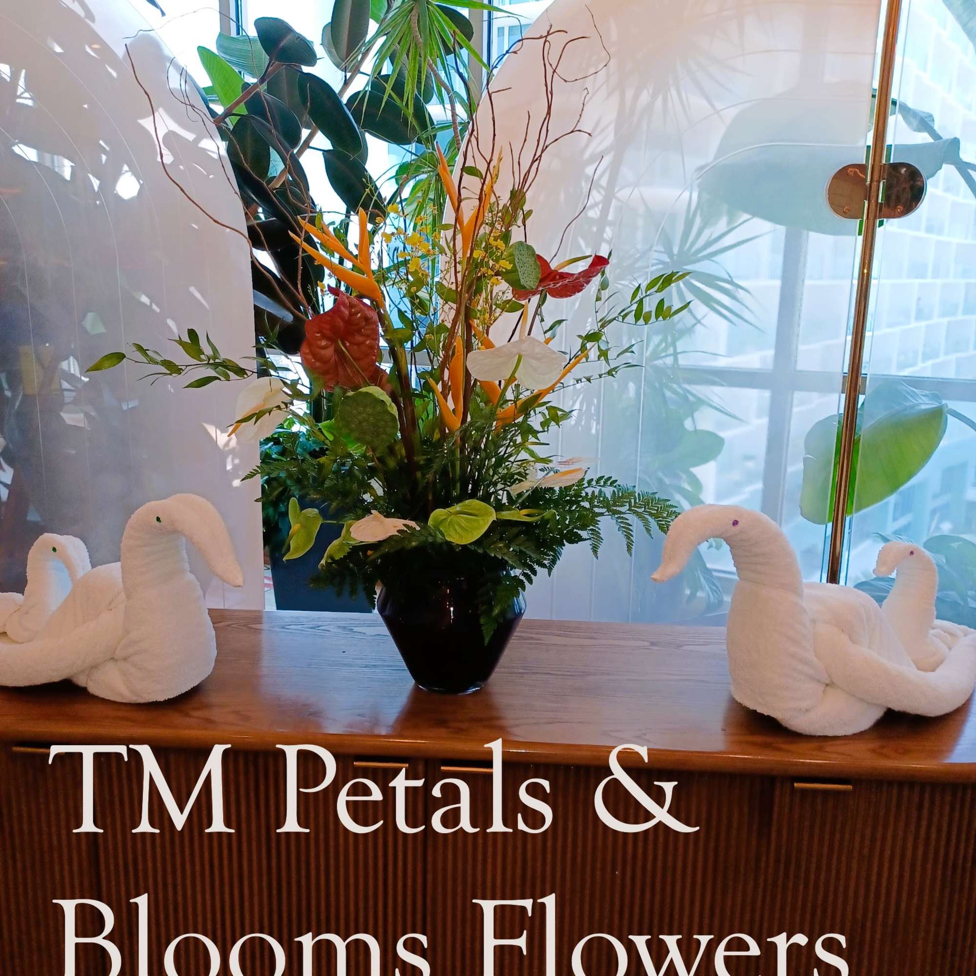 Petals &amp; Blooms Flowers only creates original designs, our tropical flowers are