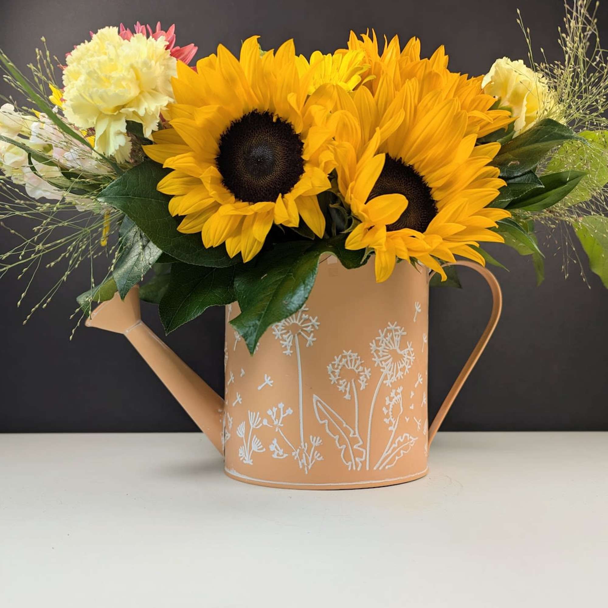 Summer&rsquo;s Watering Can
A cheerful burst of golden light, Summer&rsquo;s Watering Can captures, photo 2 of 4