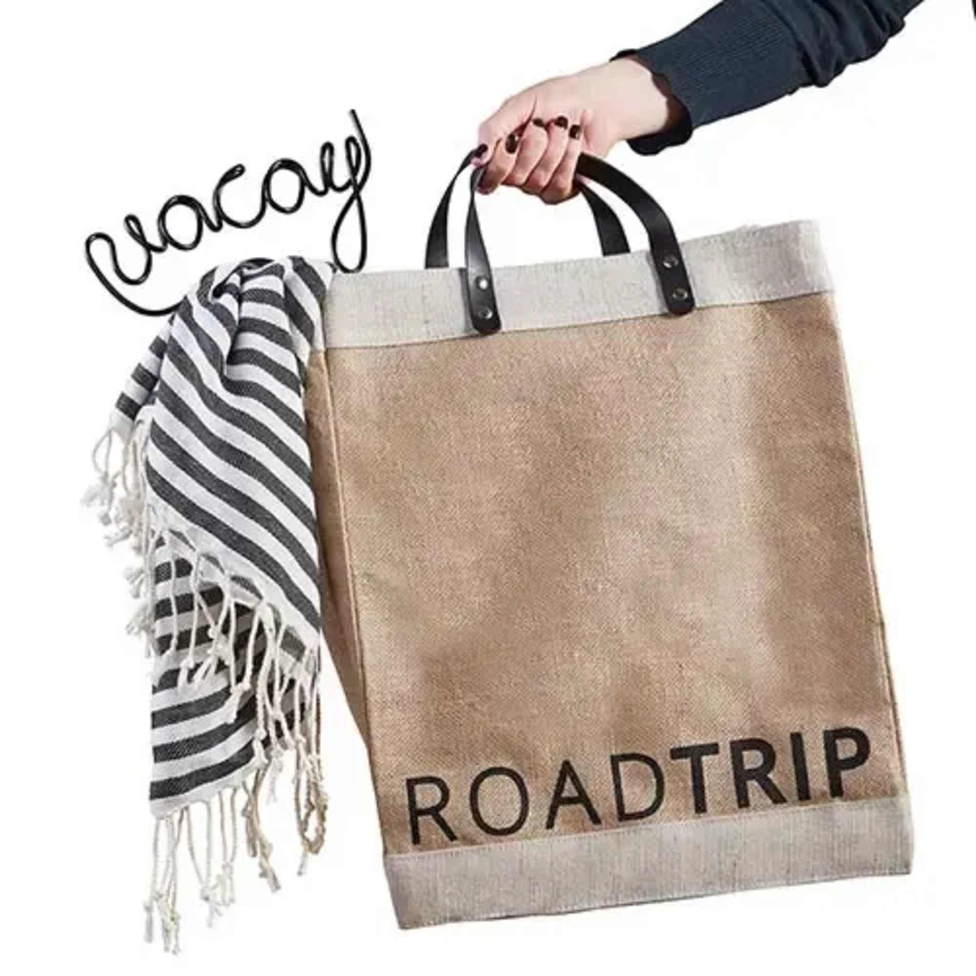 Canvas tote bag with a striped scarf and "vacay" and "ROADTRIP" text