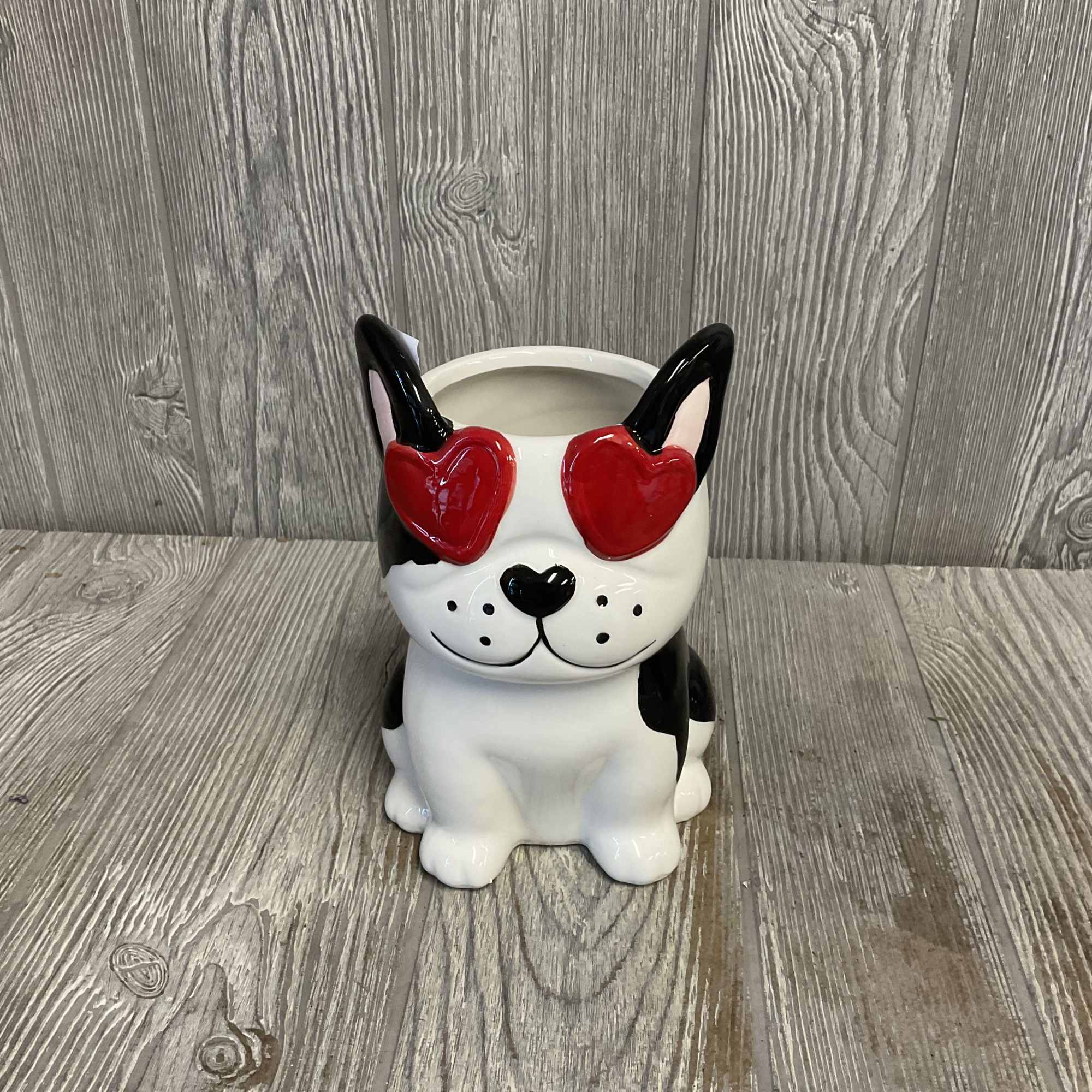 Ceramic dog-shaped planter with red heart-shaped sunglasses