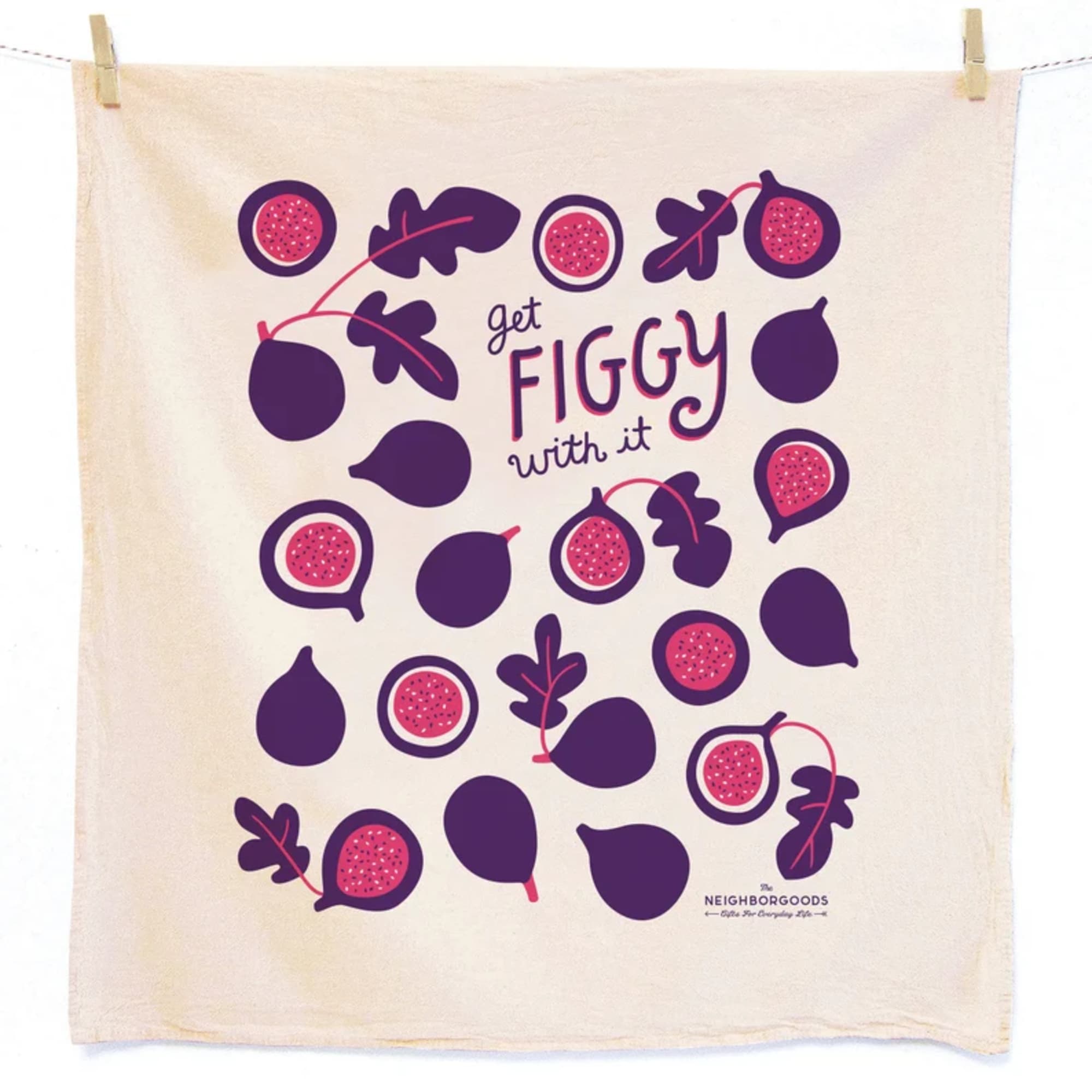 Cream tea towel with purple and pink fig illustrations and the phrase get figgy with it