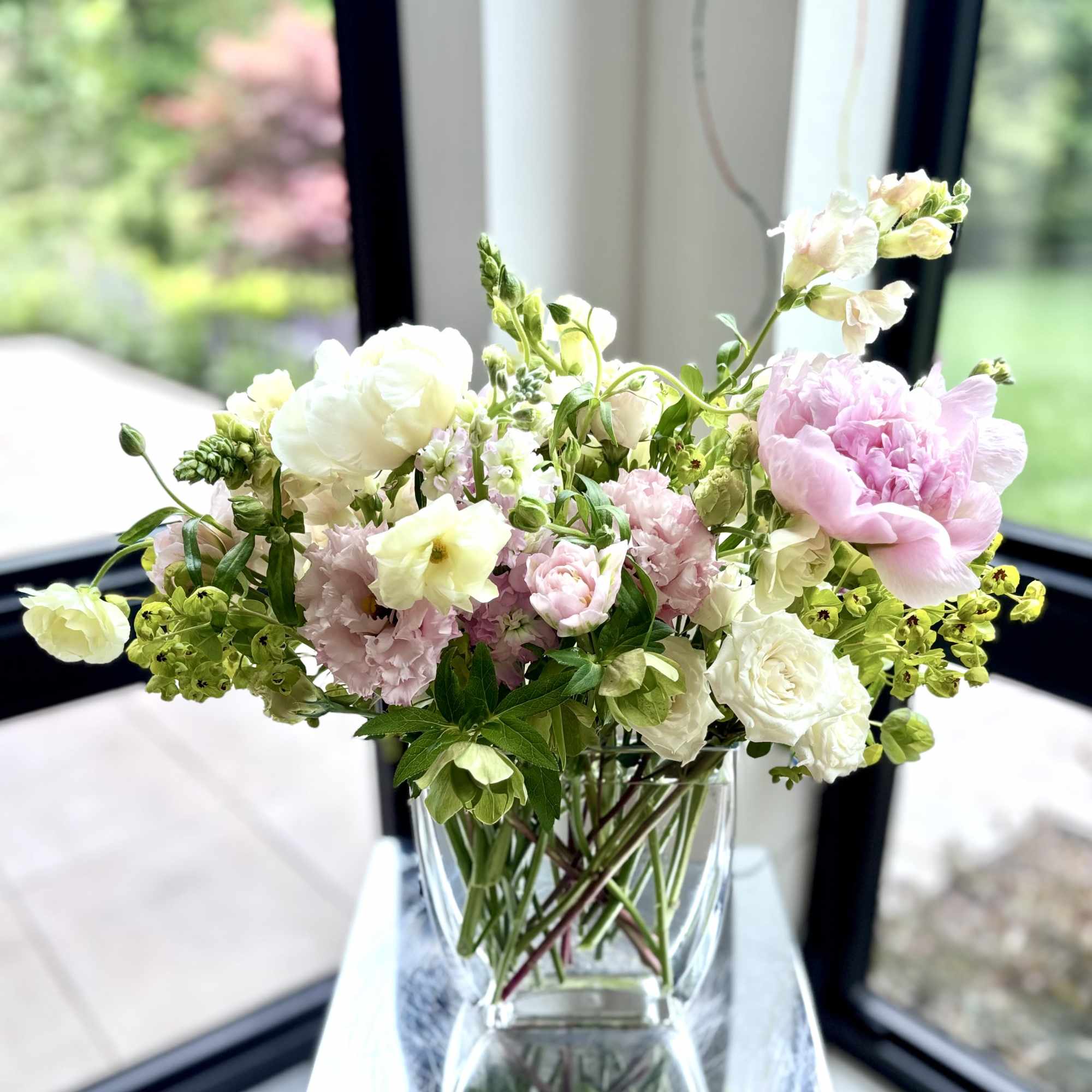 A lovely spring flower arrangement in soft blush pinks and whites. The, photo 2 of 2