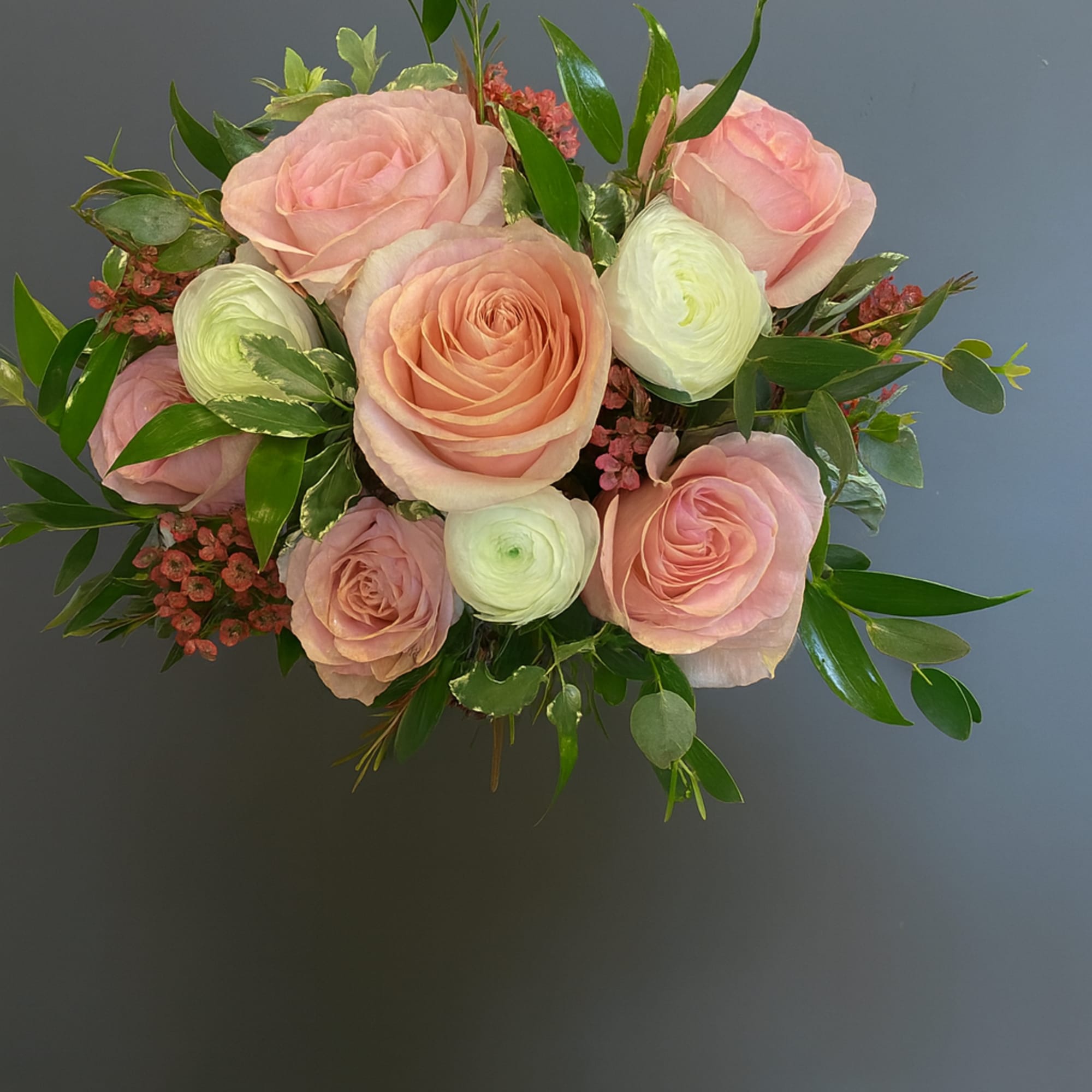 Handcrafted bouquet of roses perfect for Homecoming and Prom.  This timeless