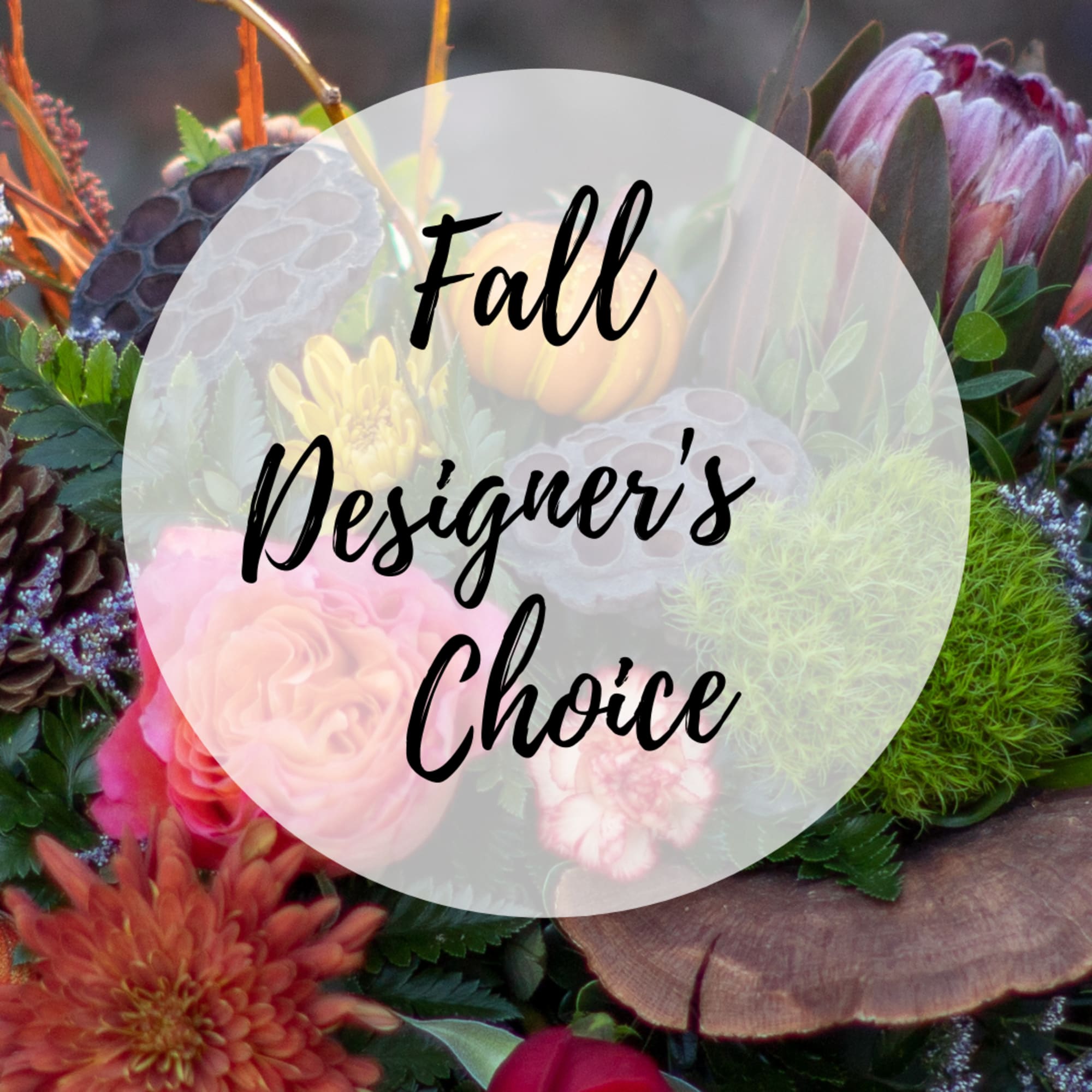 Fall floral arrangement with roses, chrysanthemums, and protea