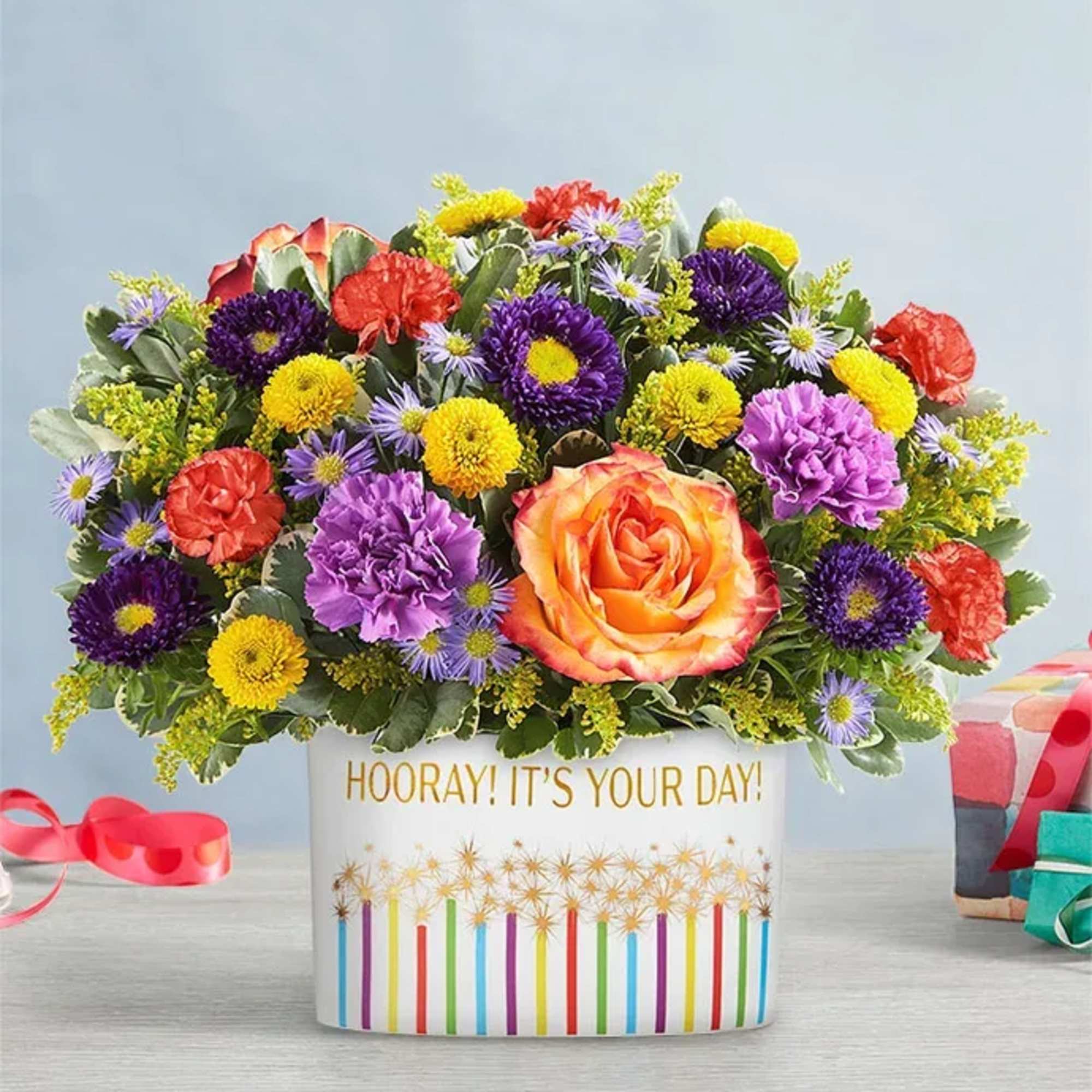 Mixed bouquet in a white gift box with colorful flowers