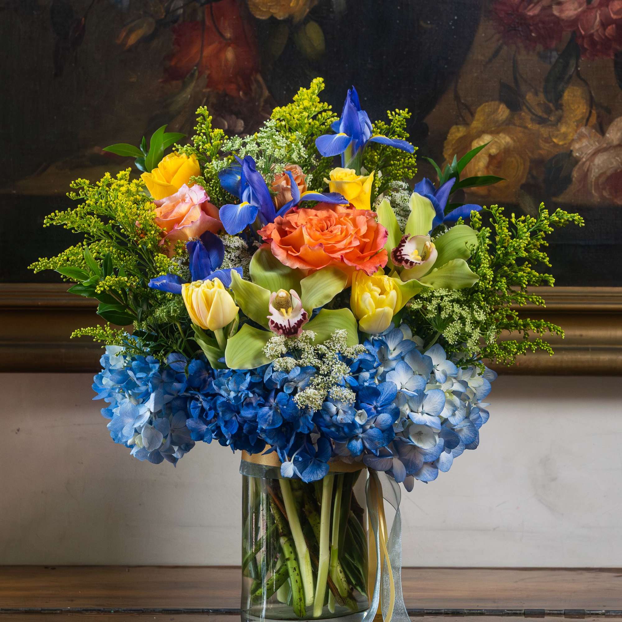 Arranged with Summer flowers including orange roses, yellow spray roses, blue hydrangeas, photo 3 of 3
