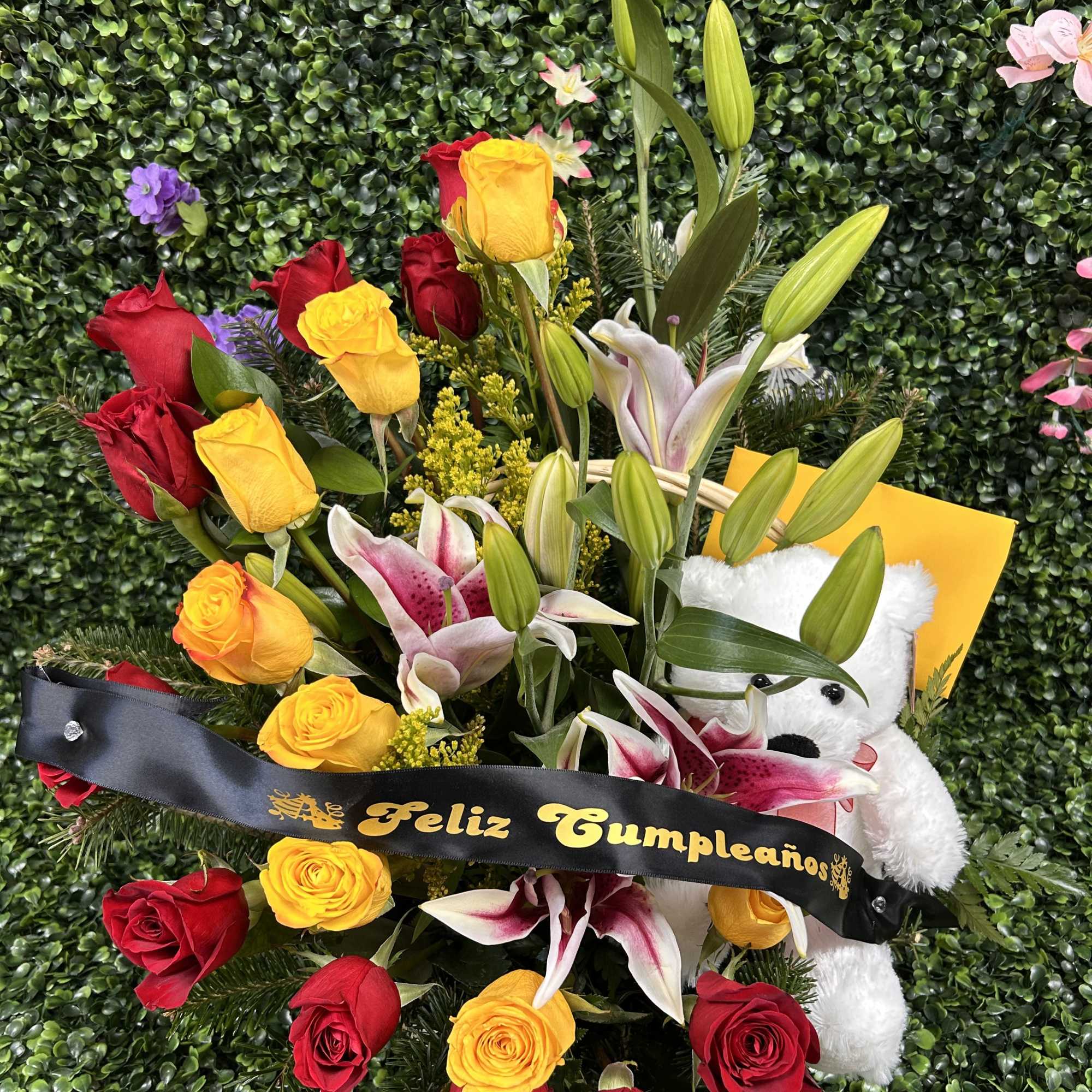 CUTE BIRTHDAY OR ANY OCASION ARRANGEMENT WITH ROSES LILIES AND A LITTLE