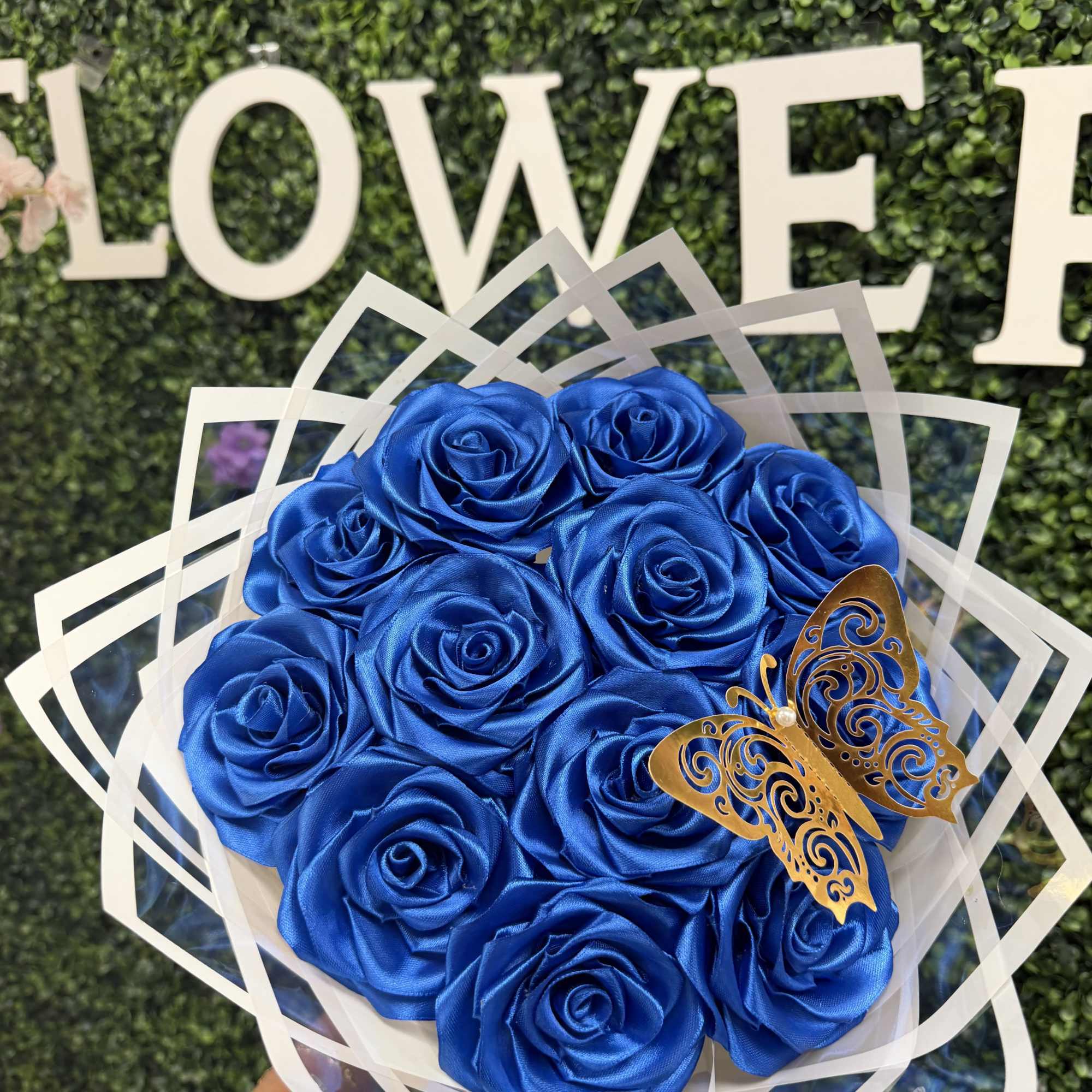 CUTE BLUE SIL ROSES BOUQUET WHICH COULD ALSO BE A NICE GIFT