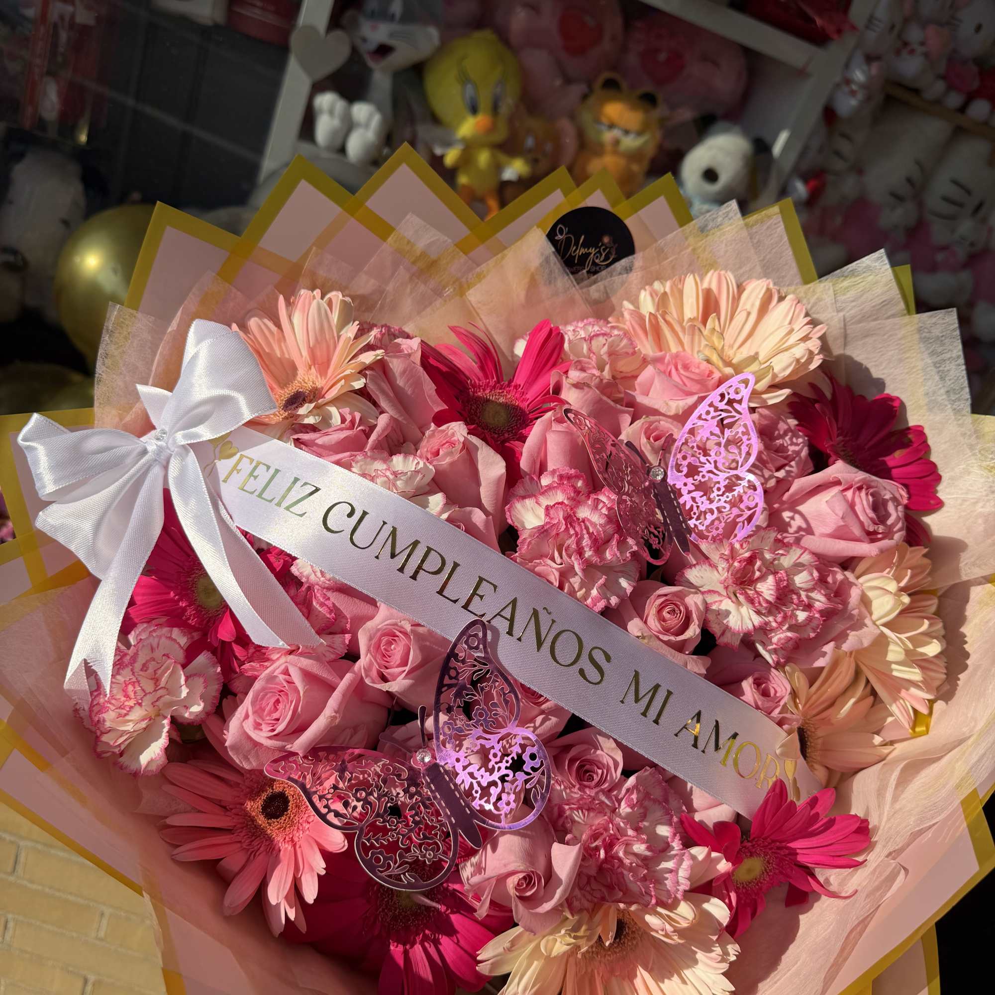 A BEAUTIFUL WRAPPED BOUQUET MIXED WITH DIFFERENT SHADES OF PINK WHITE AN, photo 2 of 2