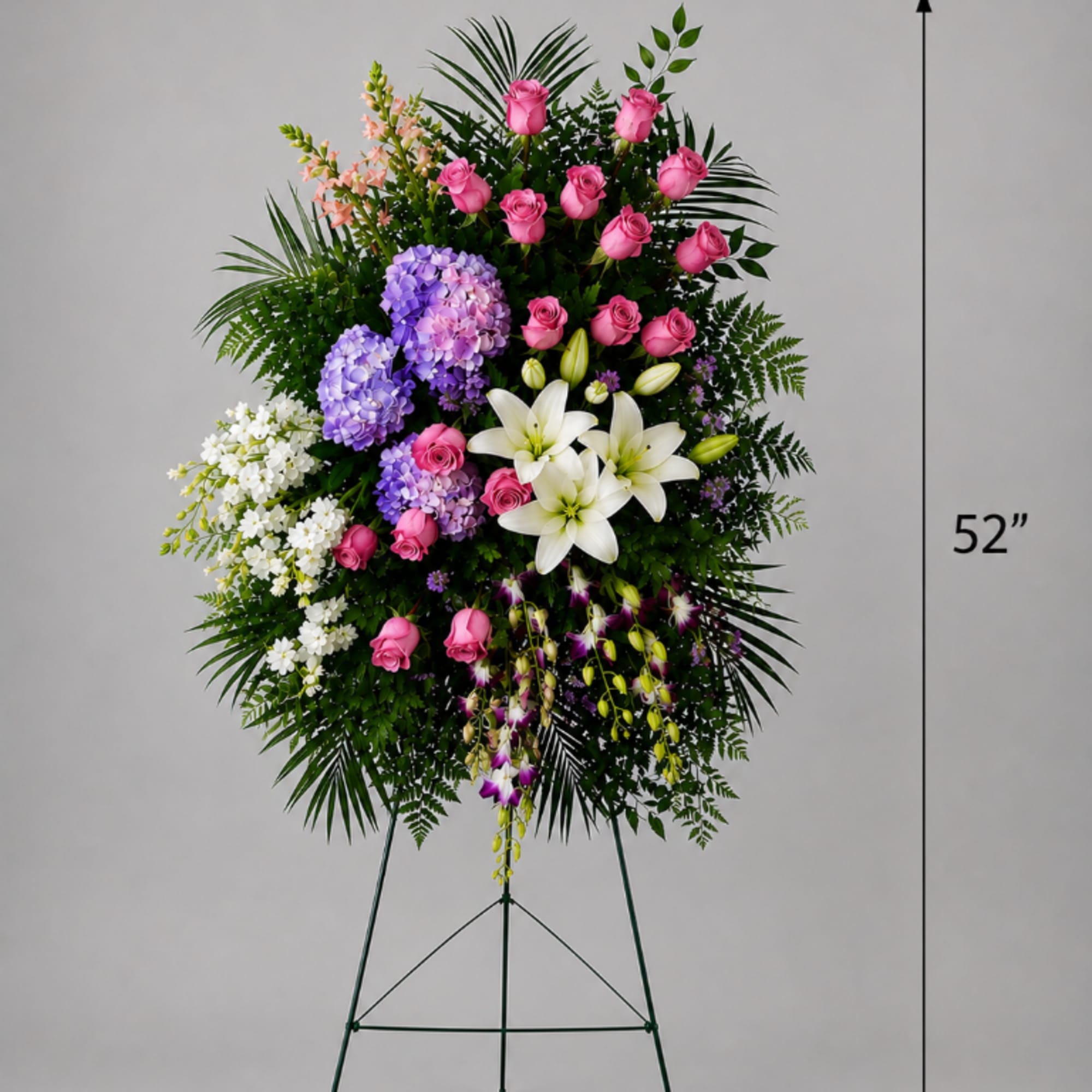 Tall standing floral spray with pink roses, white lilies, and purple hydrangeas