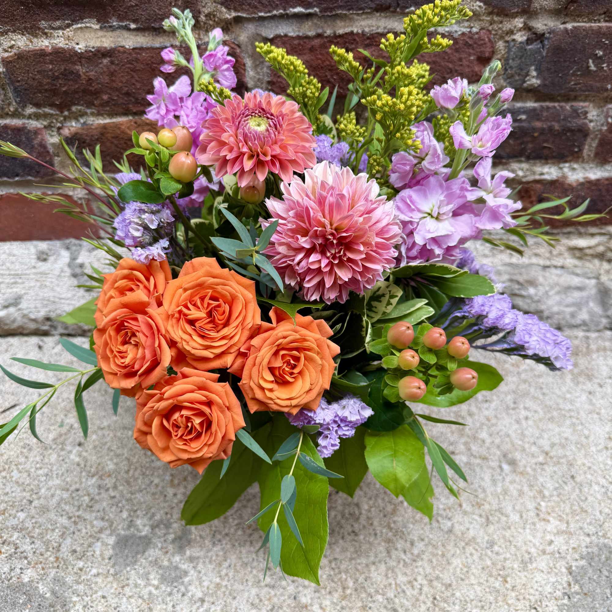 Bouquet of orange roses, pink dahlias, and lavender flowers, photo 3 of 3