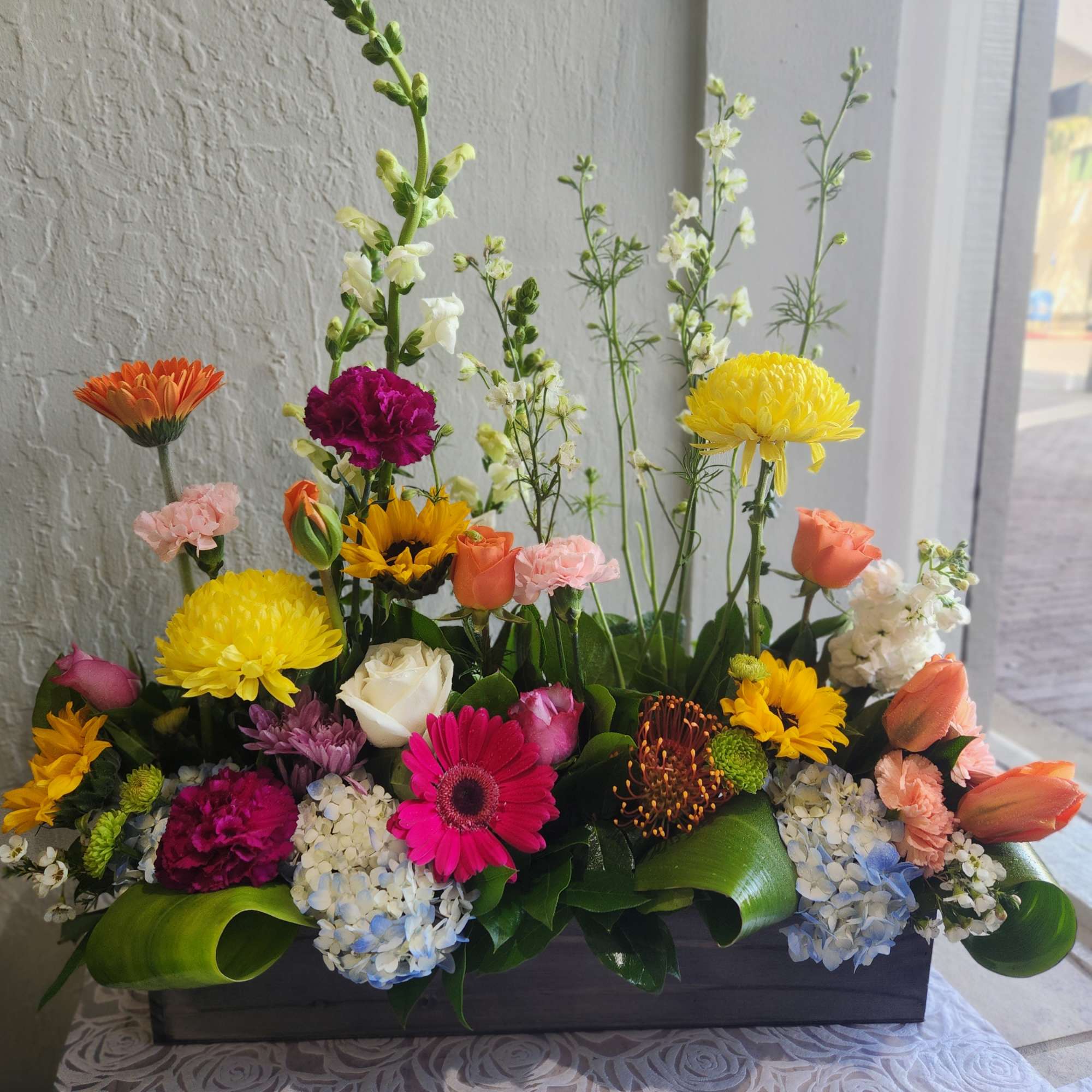 A grand Spring mix  made with seasonal  blooms,  Picture